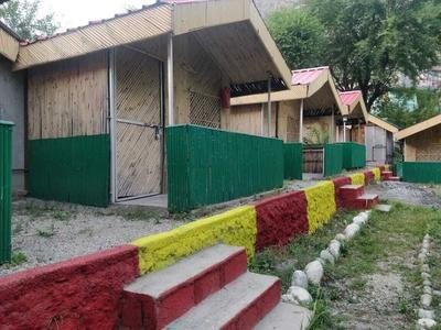 Tirthan Village Huts