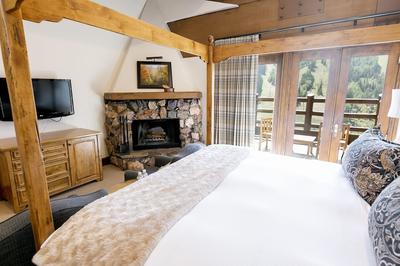 Main Lodge Luxury King Room With Hot Tub Hotel Room by RedAwning