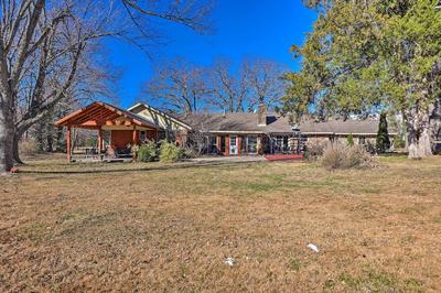 7 Mi to Lake: Expansive Rogers Villa w/ Pond!