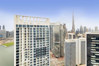 Manzil - 1BR in Business Bay w Burj & Canal Views