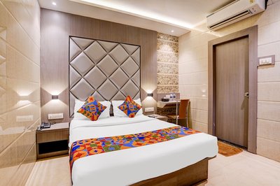 Fabhotel Abrol Suites