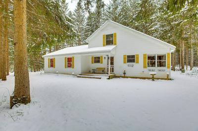 < 1 Mi to Snowmobile Trails: Cozy Cadillac Retreat