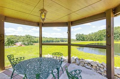 Pool, Lake & Patio: Sweeping De Soto Estate