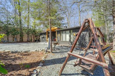 Near Lake + Trails: Rustic Newland Cabin w/ Deck!