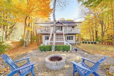 Cottage w/ Private Beach + Fire Pit in Manistee!