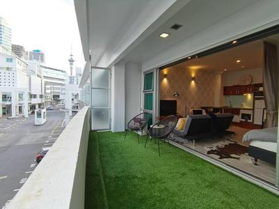 Viaduct Apartment With a Balcony