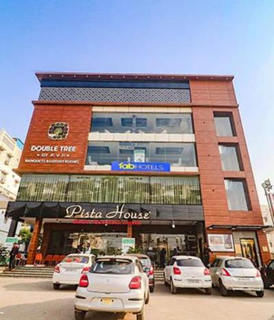 Fabhotel Twin Tree Suites