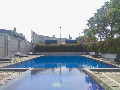 Cozy With Good Location Studio At Tifolia Apartment By Travelio