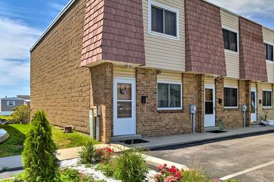 Deck w/ Canal Access: Ocean City Townhome