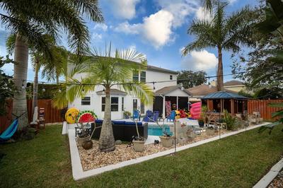Gorgeous Urban Oasis W/hot Tub, Heated Pool And Private Movie Theater 3 Bedroom Home by RedAwning