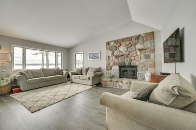 Dock & Views: Lake Mitchell Home in Cadillac!
