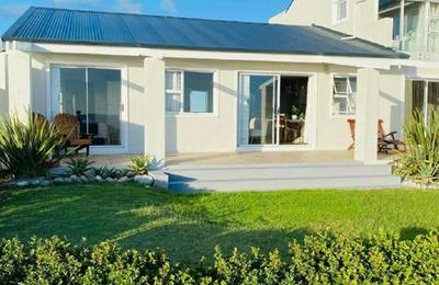 Shores Edge Cottage and Seapearl Ocean Front Villa