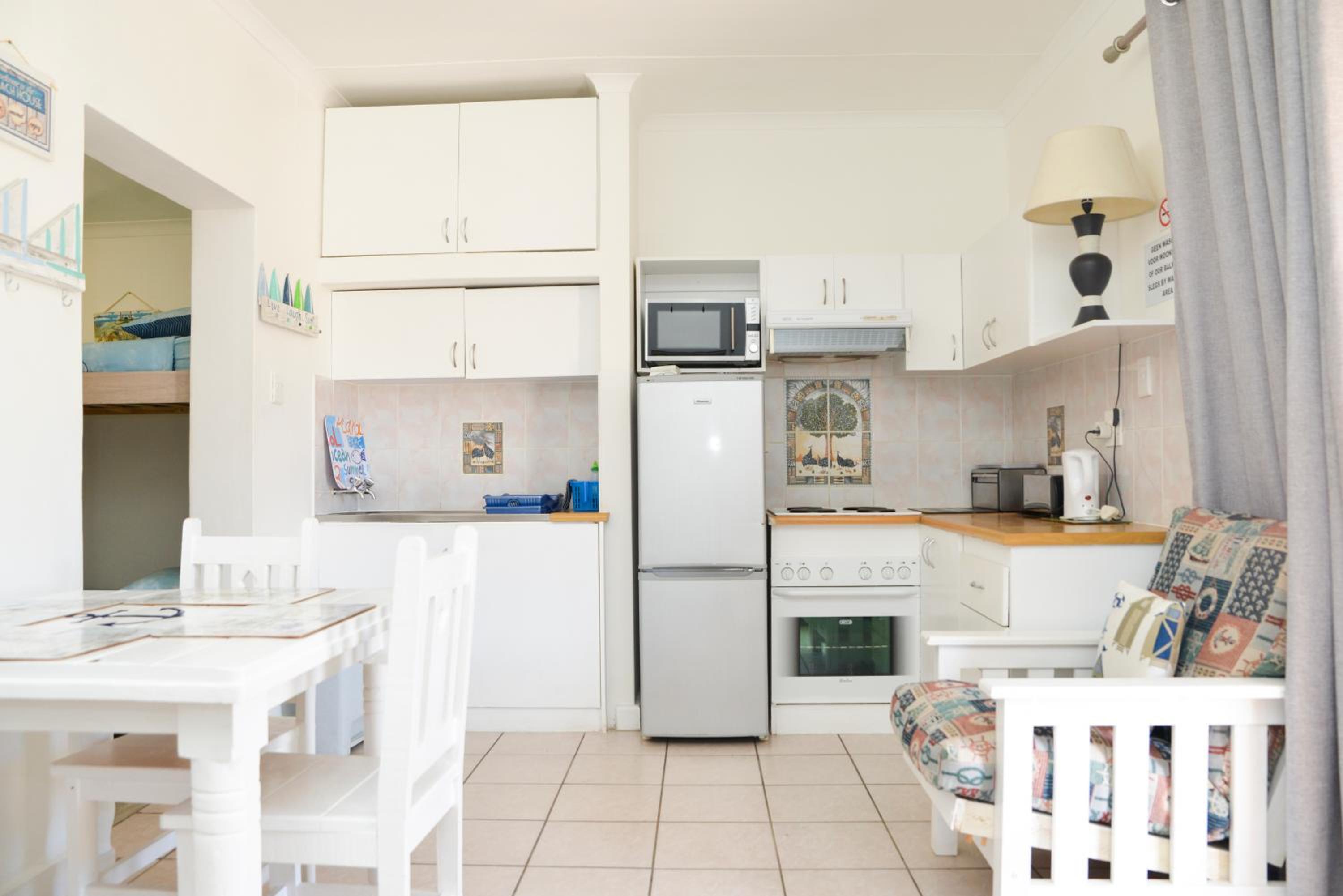 One-Bedroom Apartment with Patio (4 Adults) - 11 photo 3