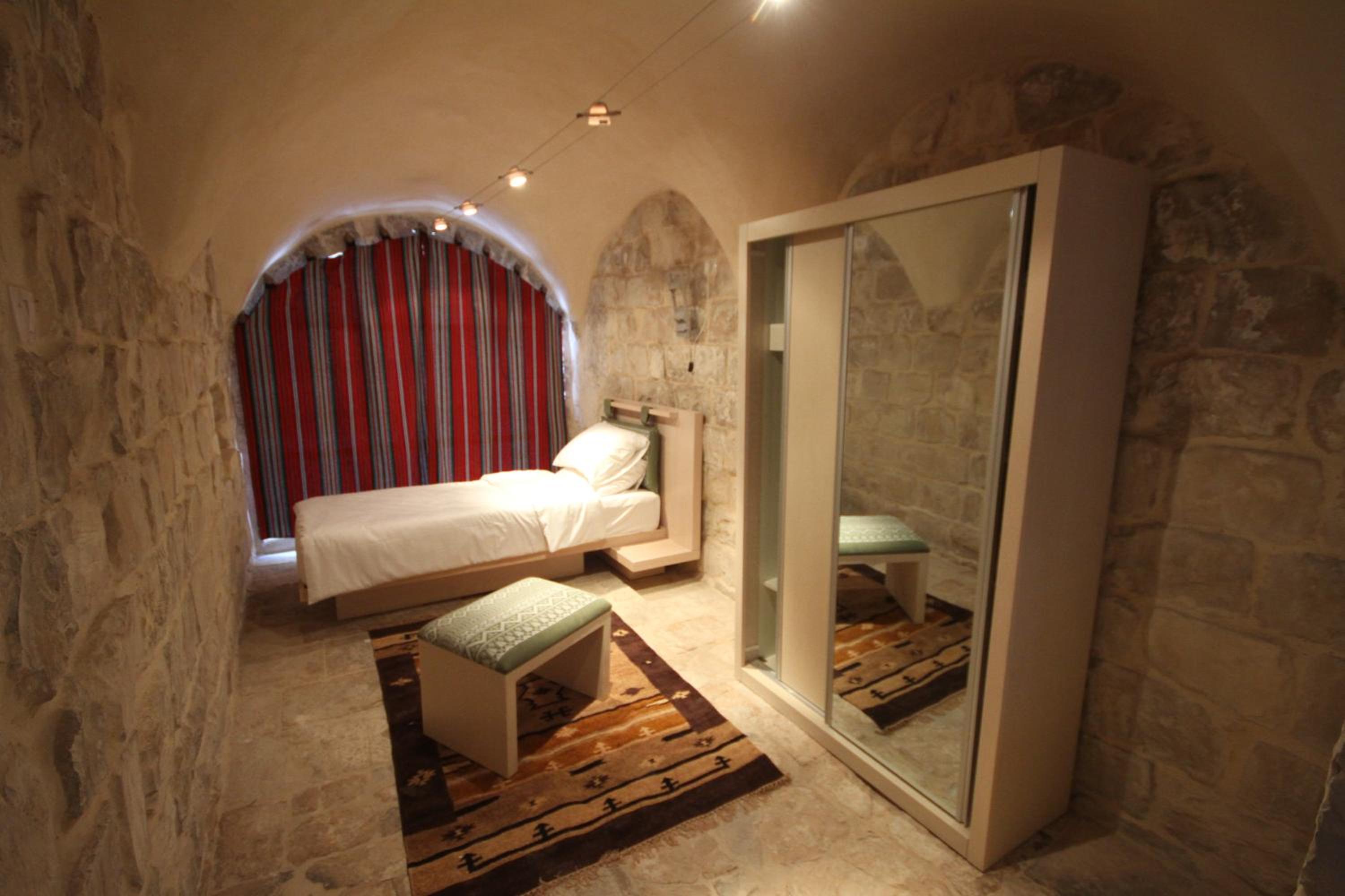 Single Bed In Male Dormitory Room