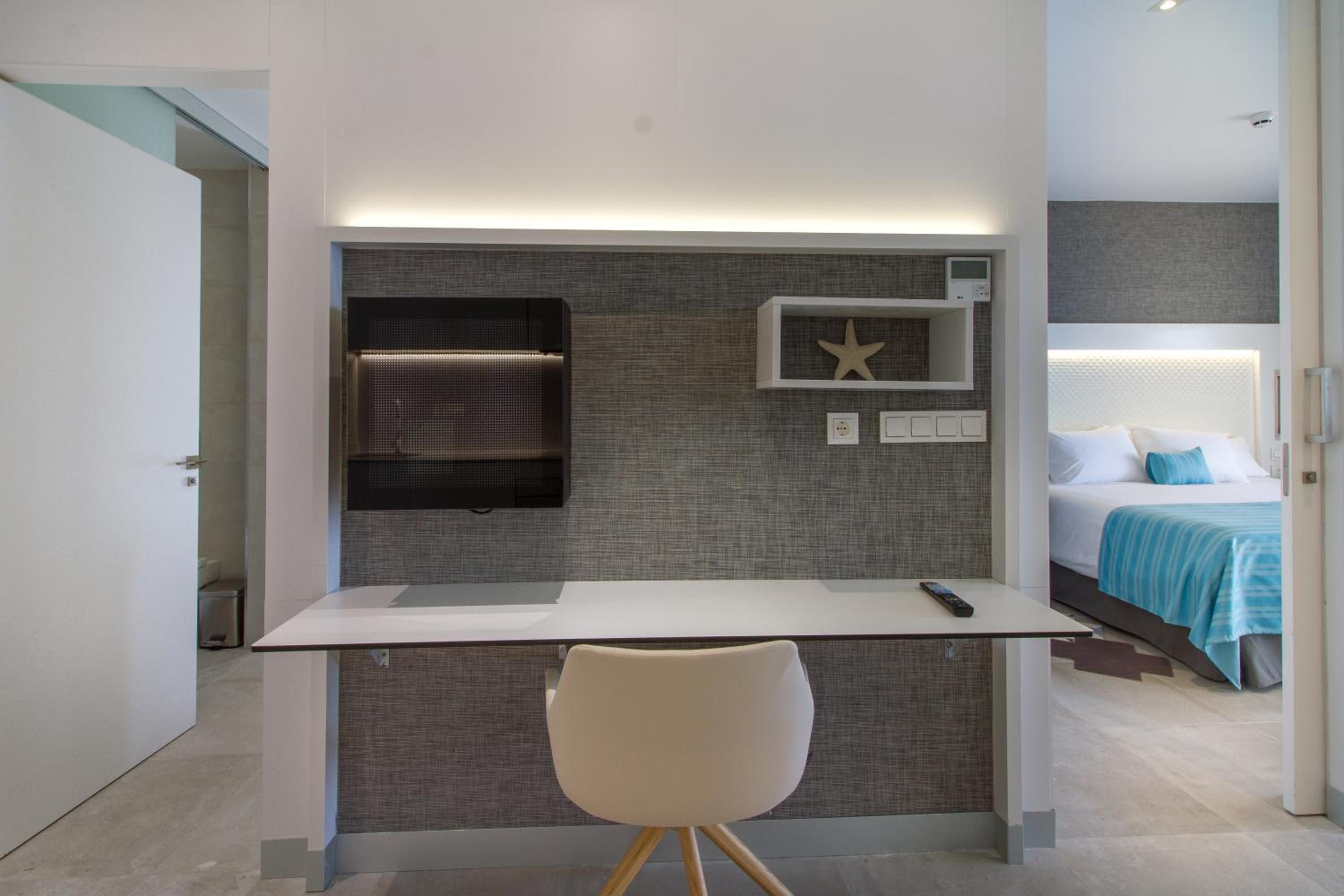 Suite con Balcón (2 Adultos + 2 Niños)