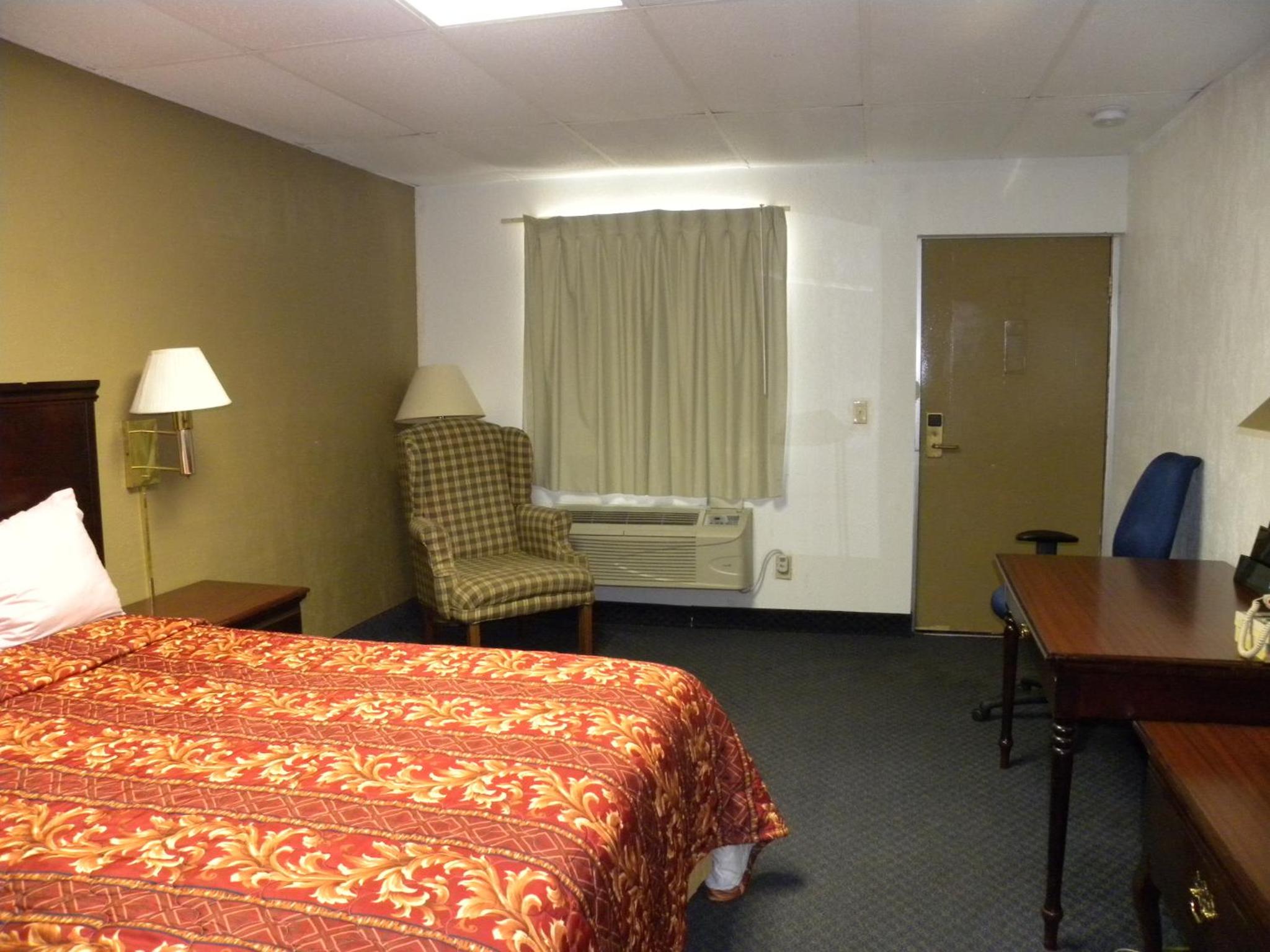 Deluxe King bed Nonsmoking - Photo 1