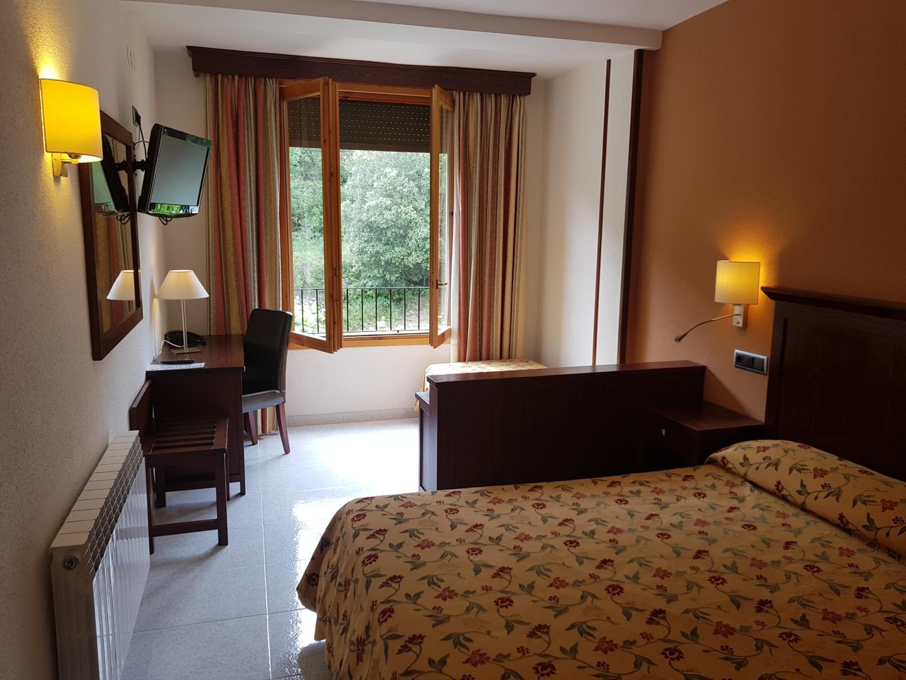 Habitación familiar (2 adultos + 1 niño)