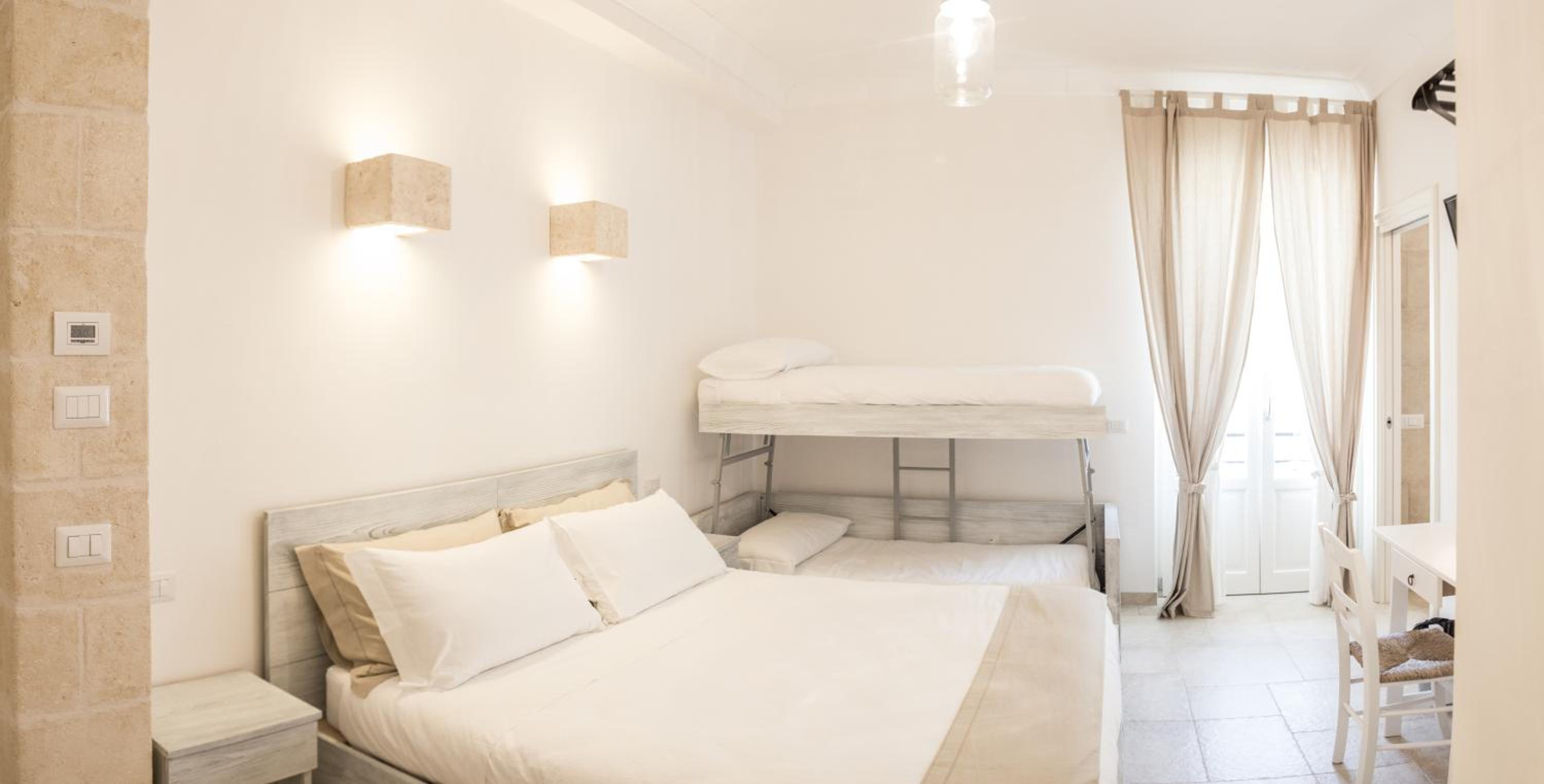 Deluxe Quadruple Room - Photo 4