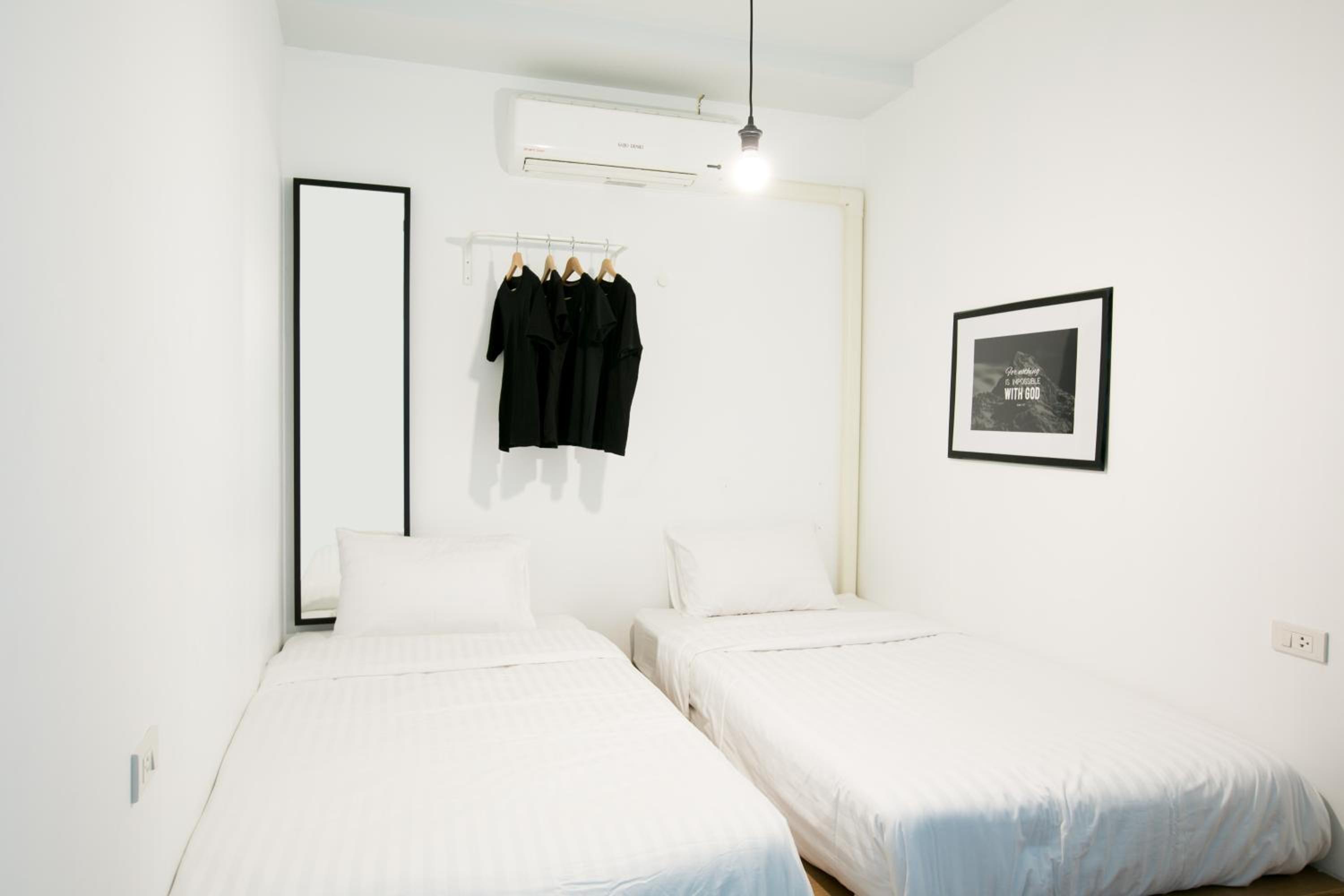 Quarto Duplo com Banheiro Compartilhado