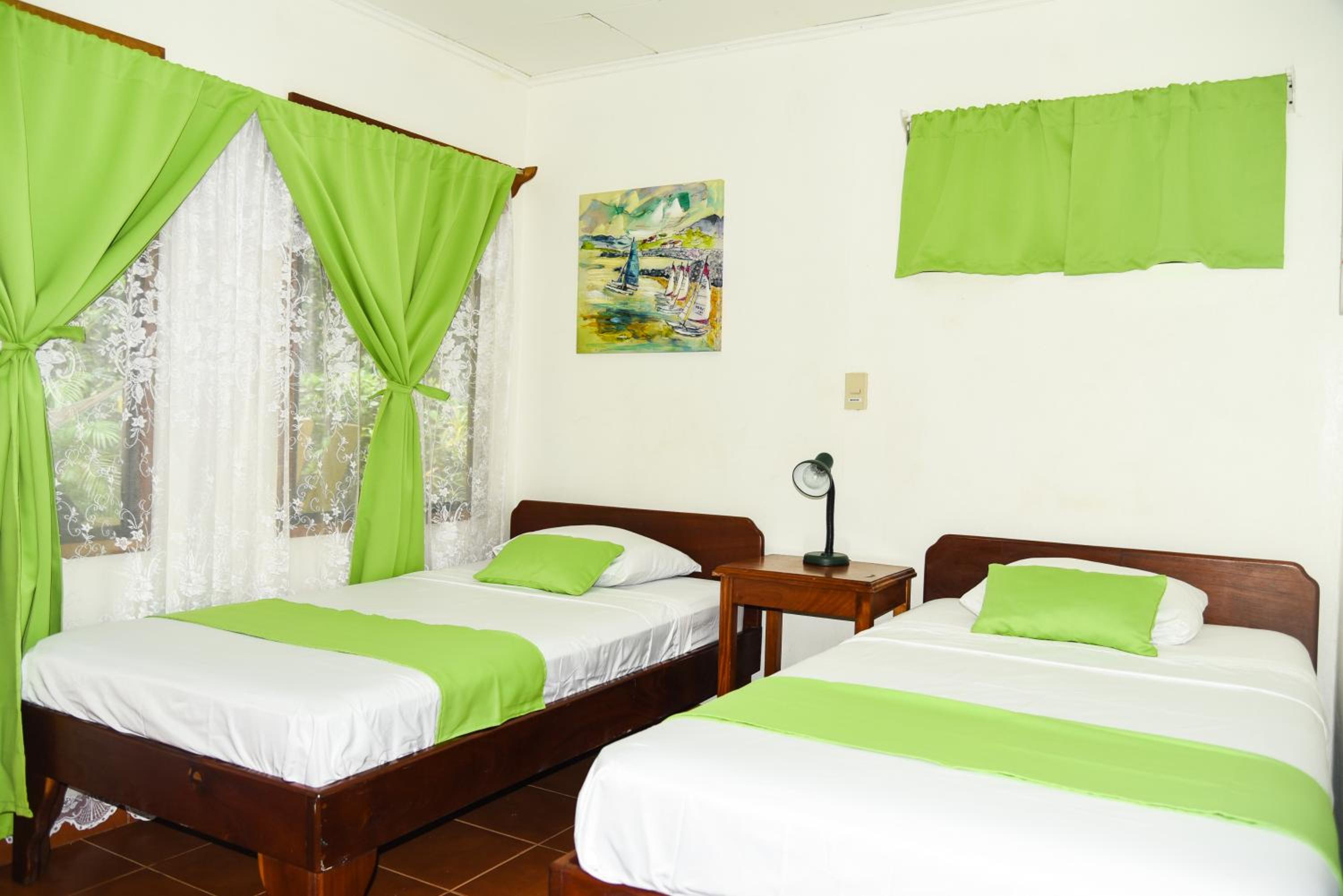 Deluxe Double Room (A/C, TV, Private Bathroom with Hot Water)