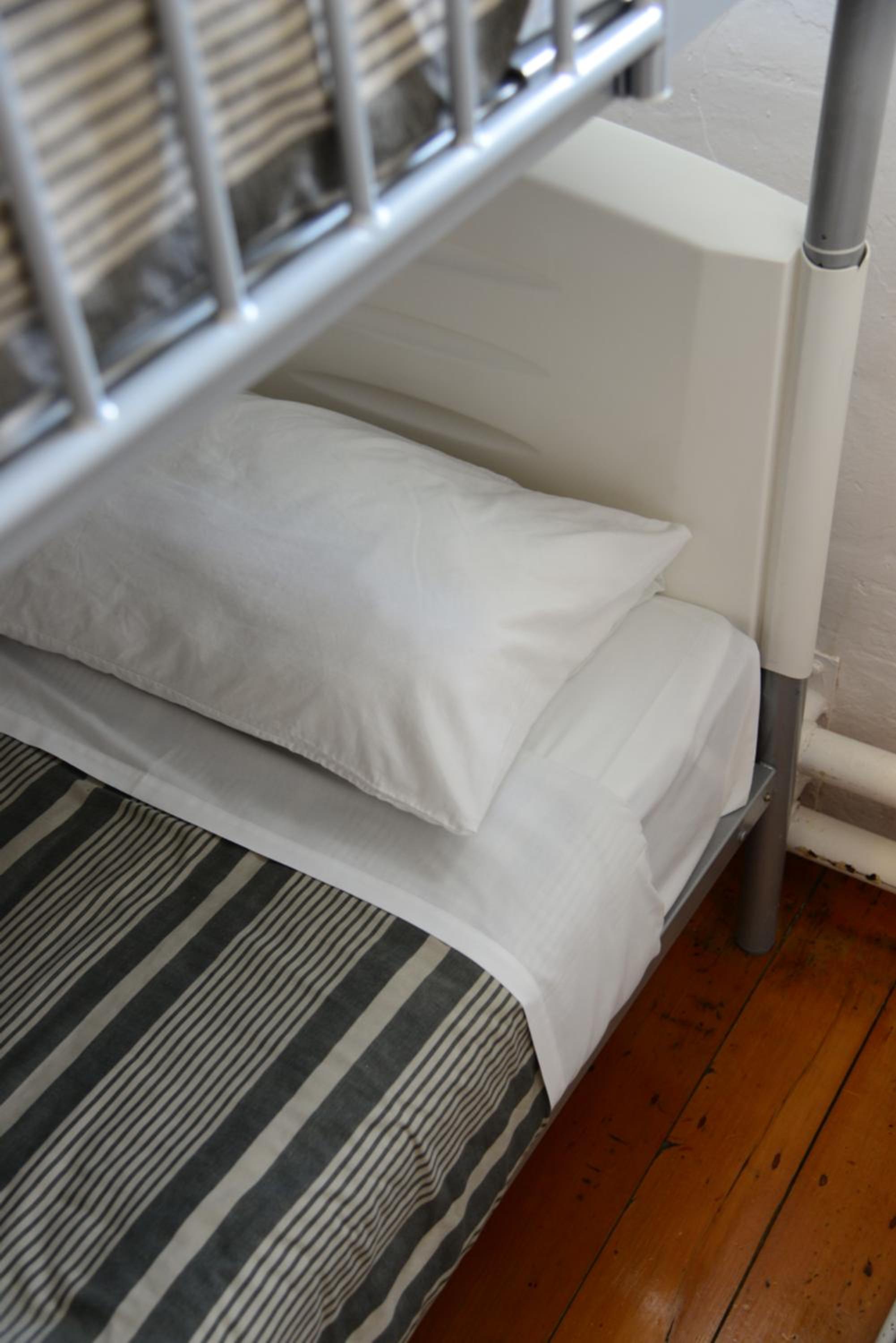 Single Bed in Male Dormitory Room photo 1