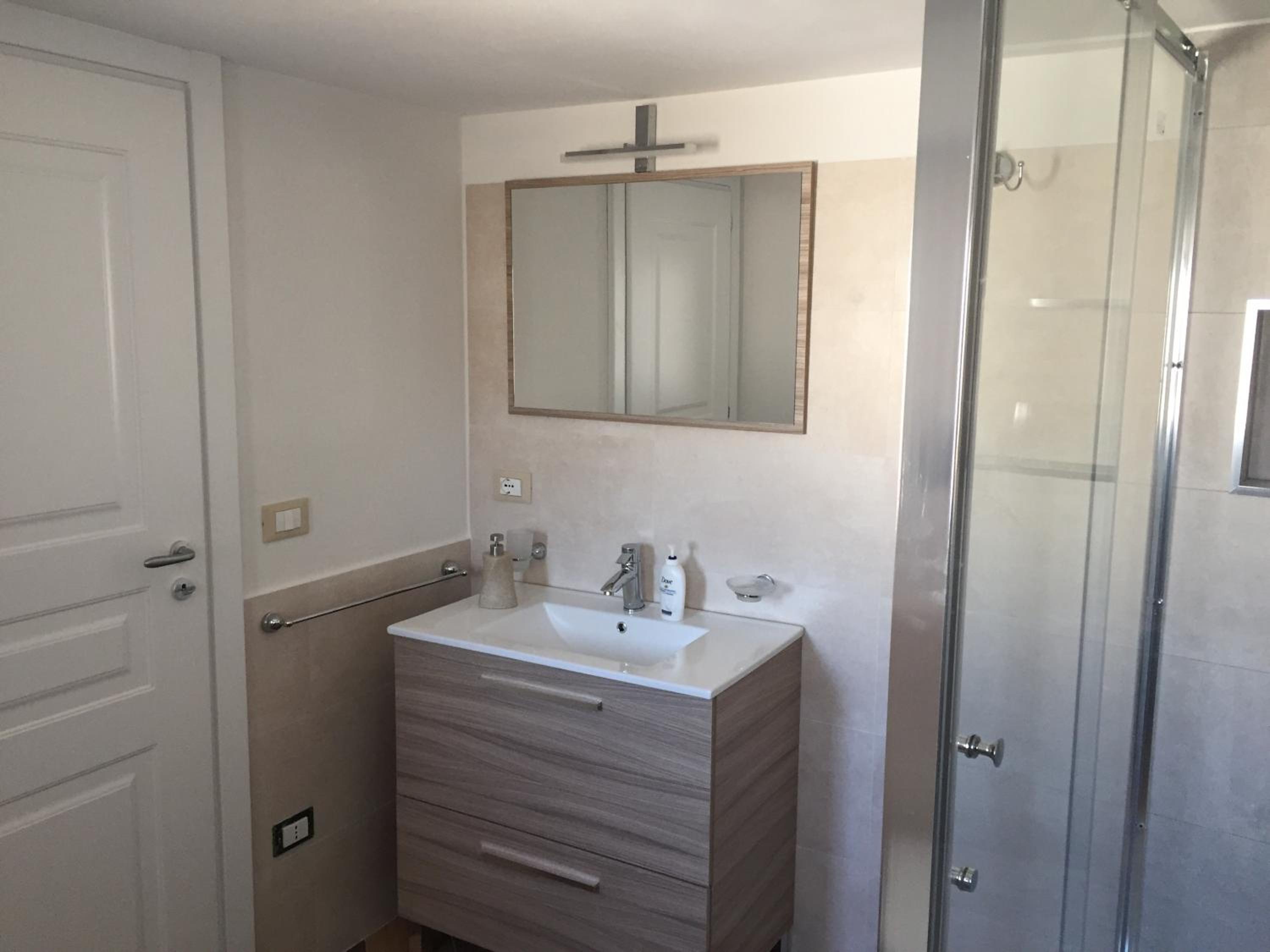 Three-Bedroom House - Photo 21