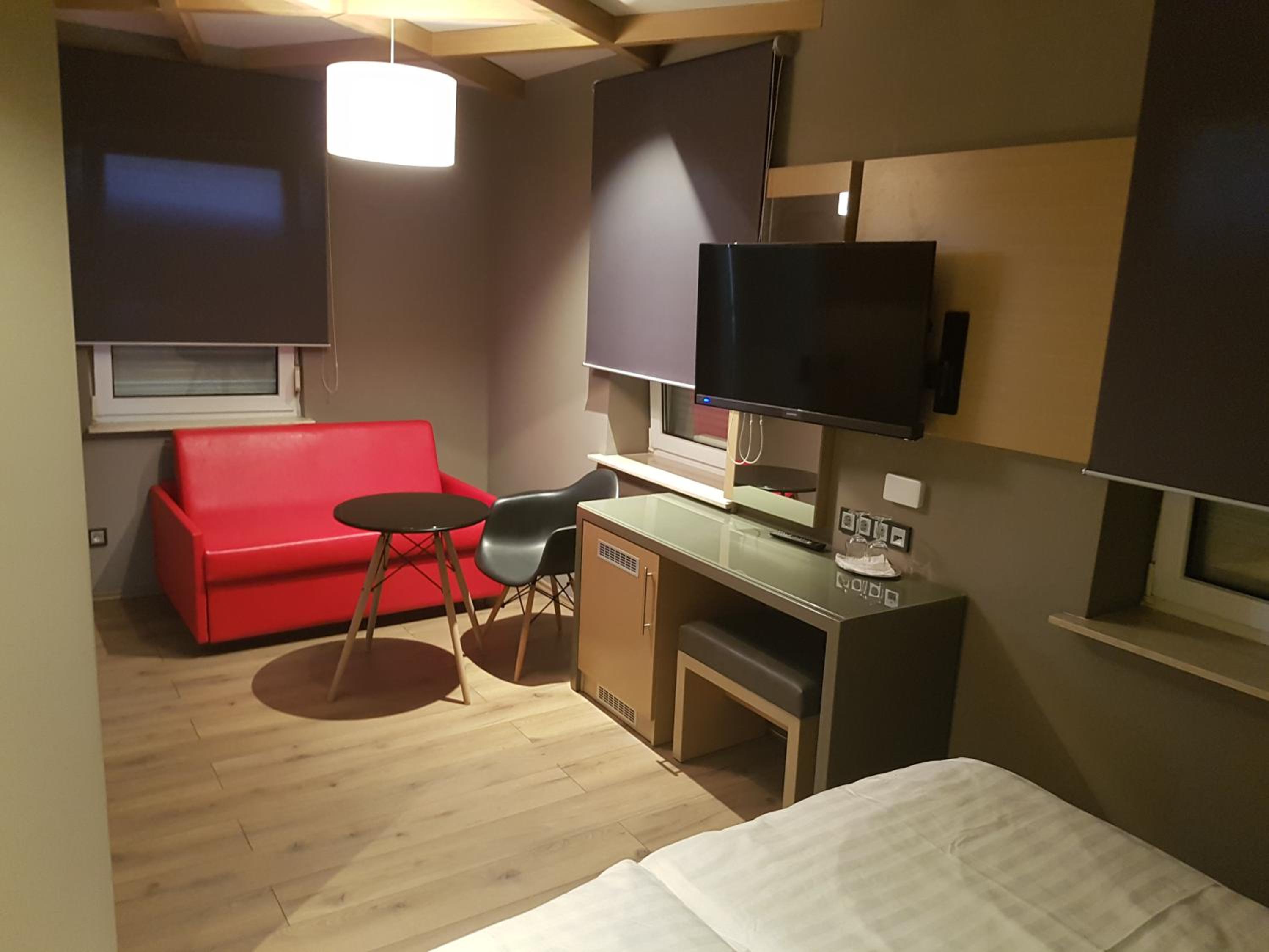Deluxe Triple Room - Photo 12
