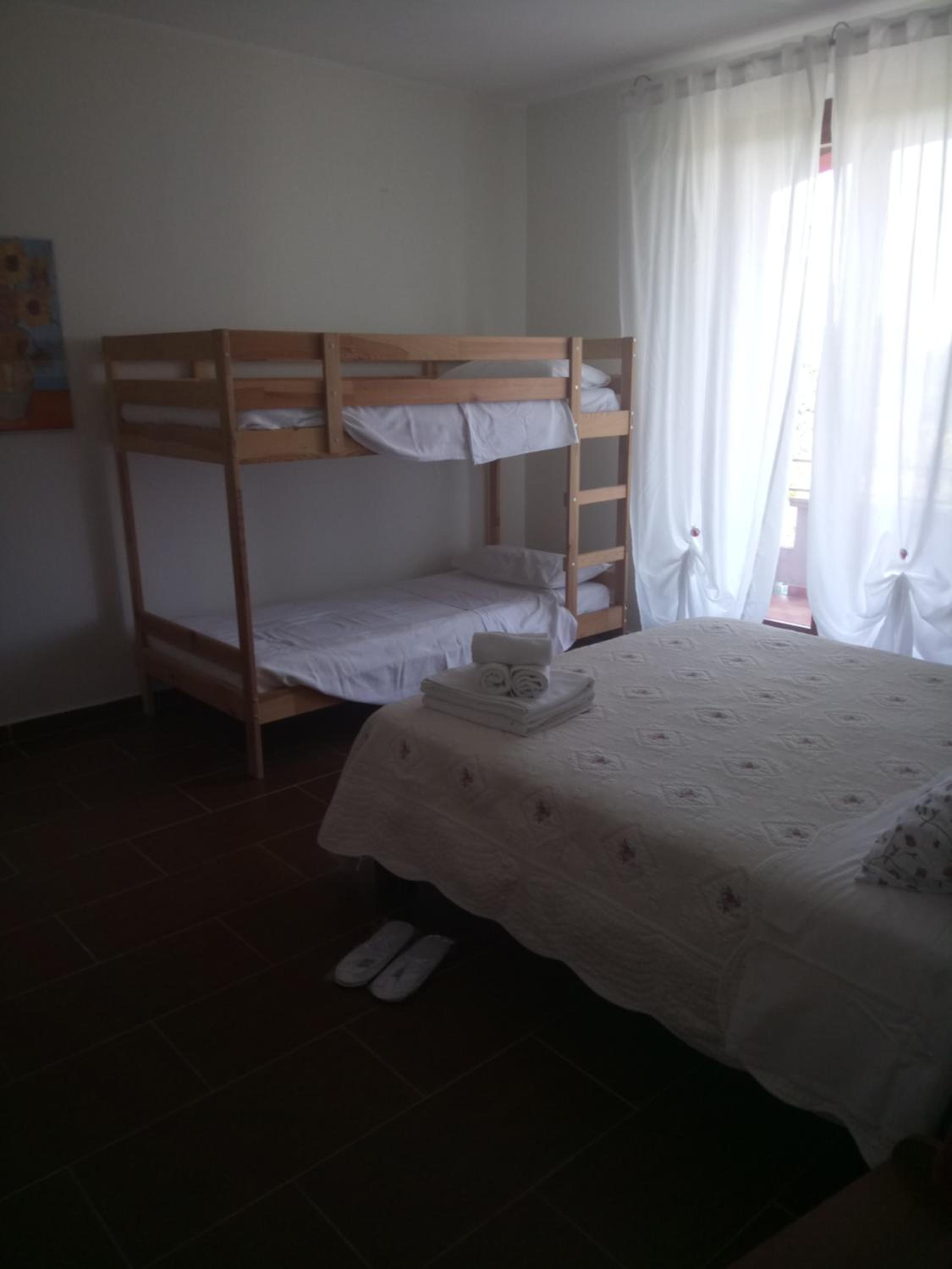 Quadruple Room with Private Bathroom photo 1