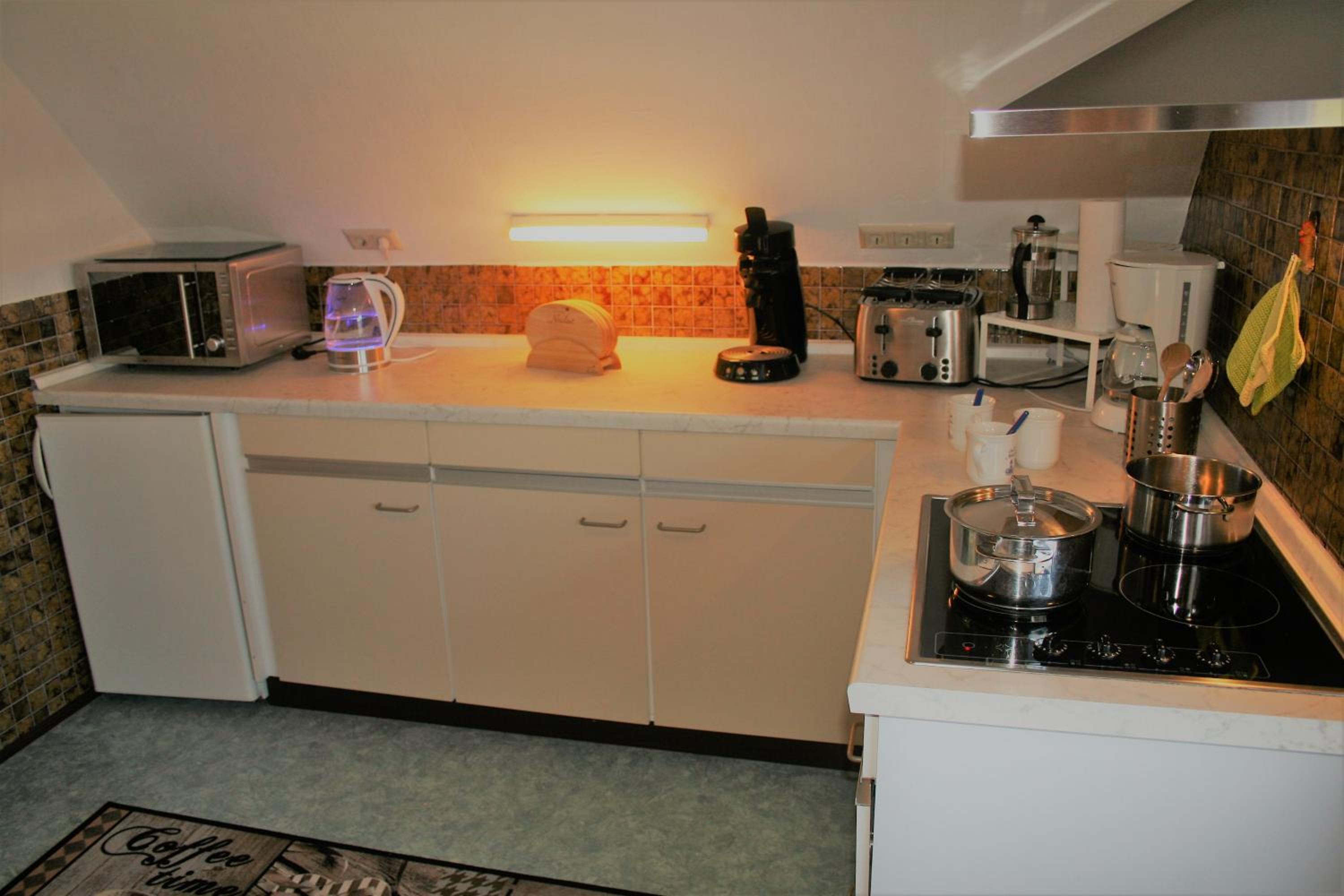Three-Bedroom Apartment - Photo 18