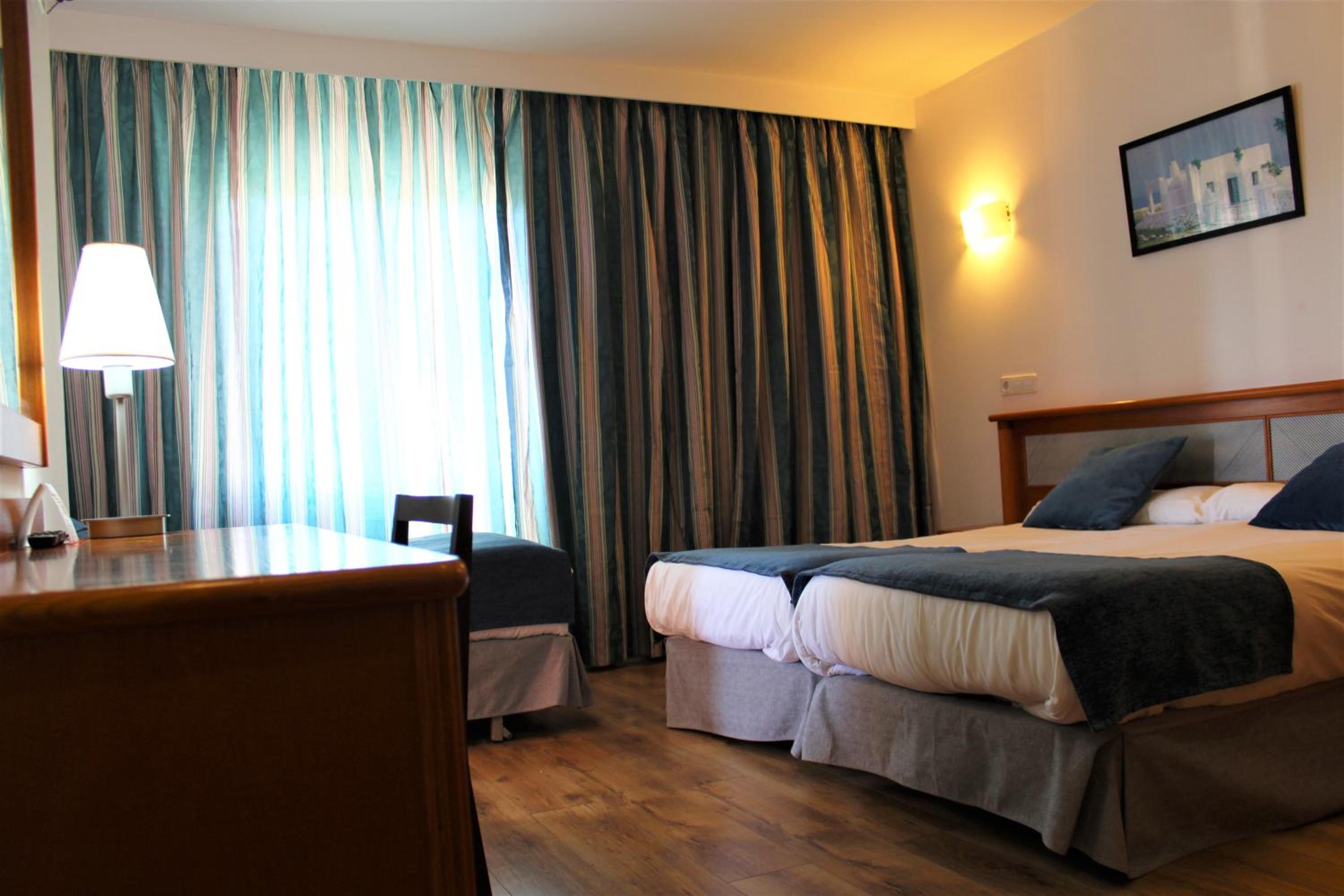 Habitación Doble (2 Adultos + 1 Niño)