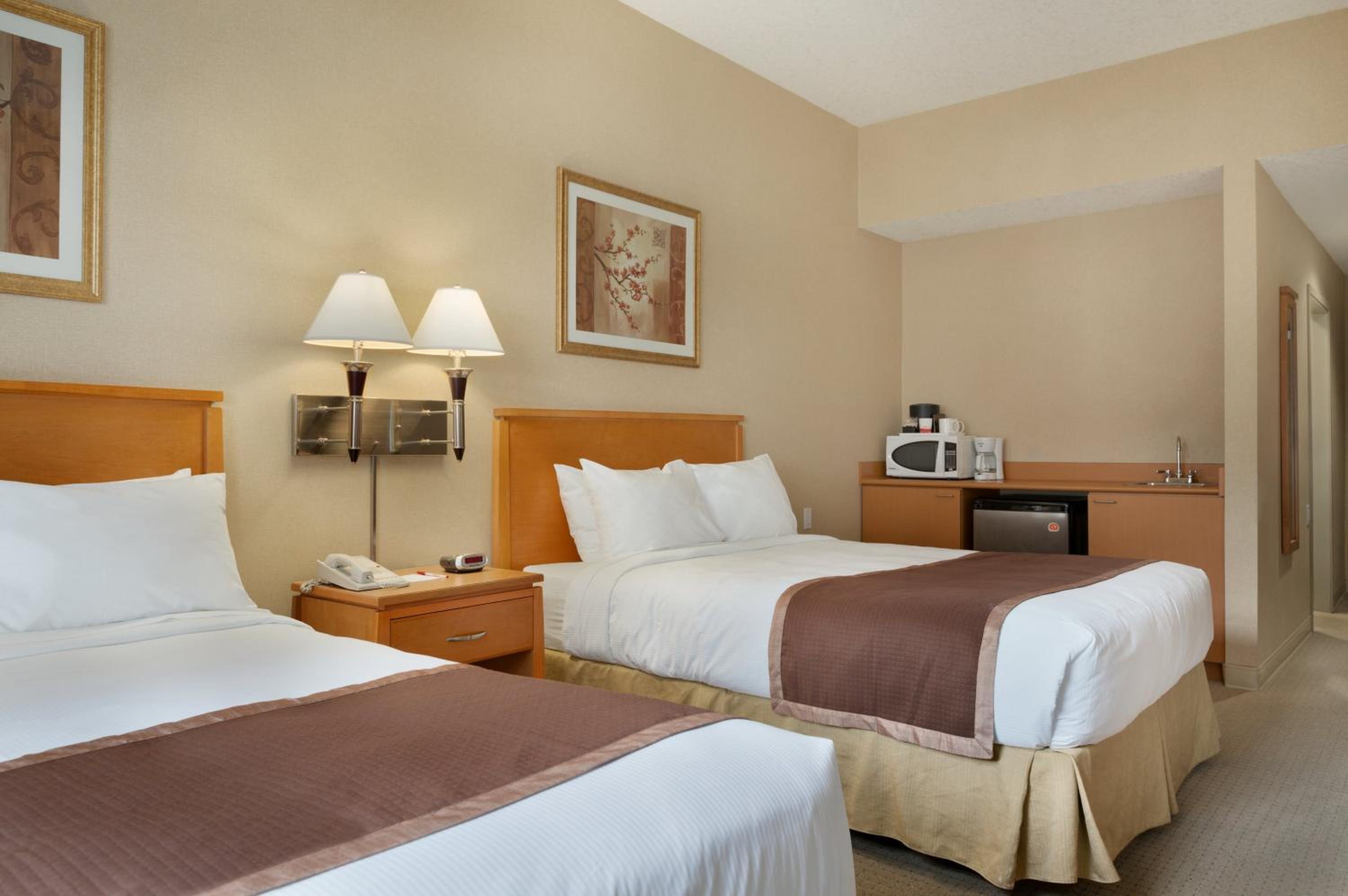 Queen Room with Two Queen Beds - Non-Smoking - Photo 1