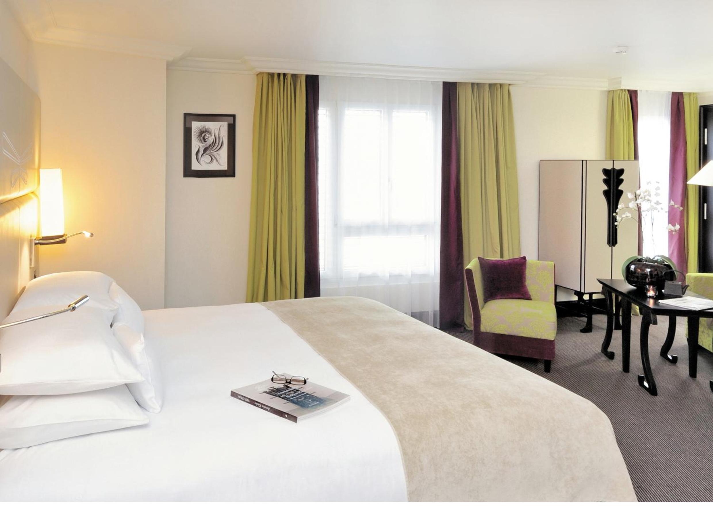 Comfort meets elegance in this stylish hotel room.