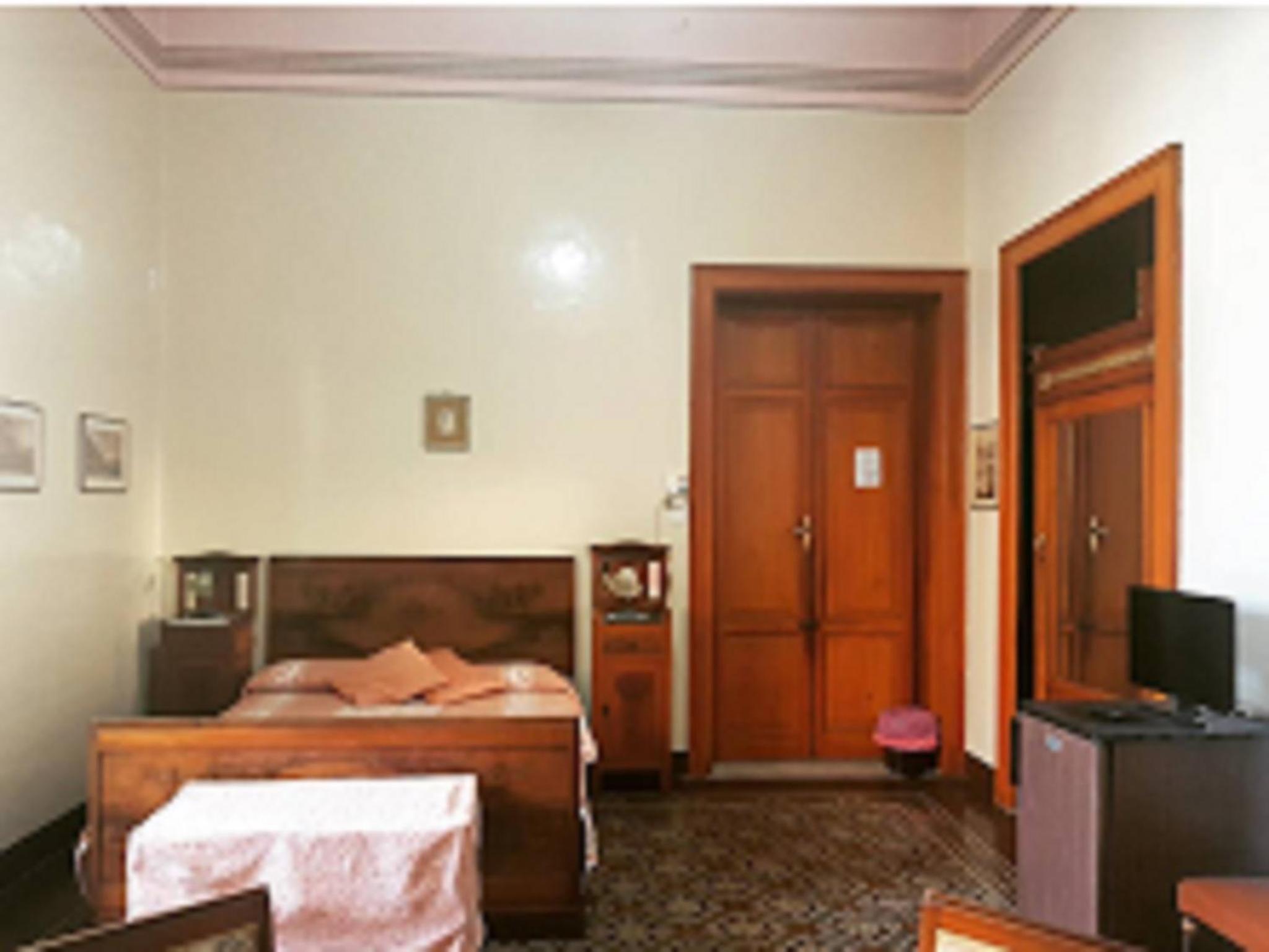 Quadruple Room with Private Bathroom