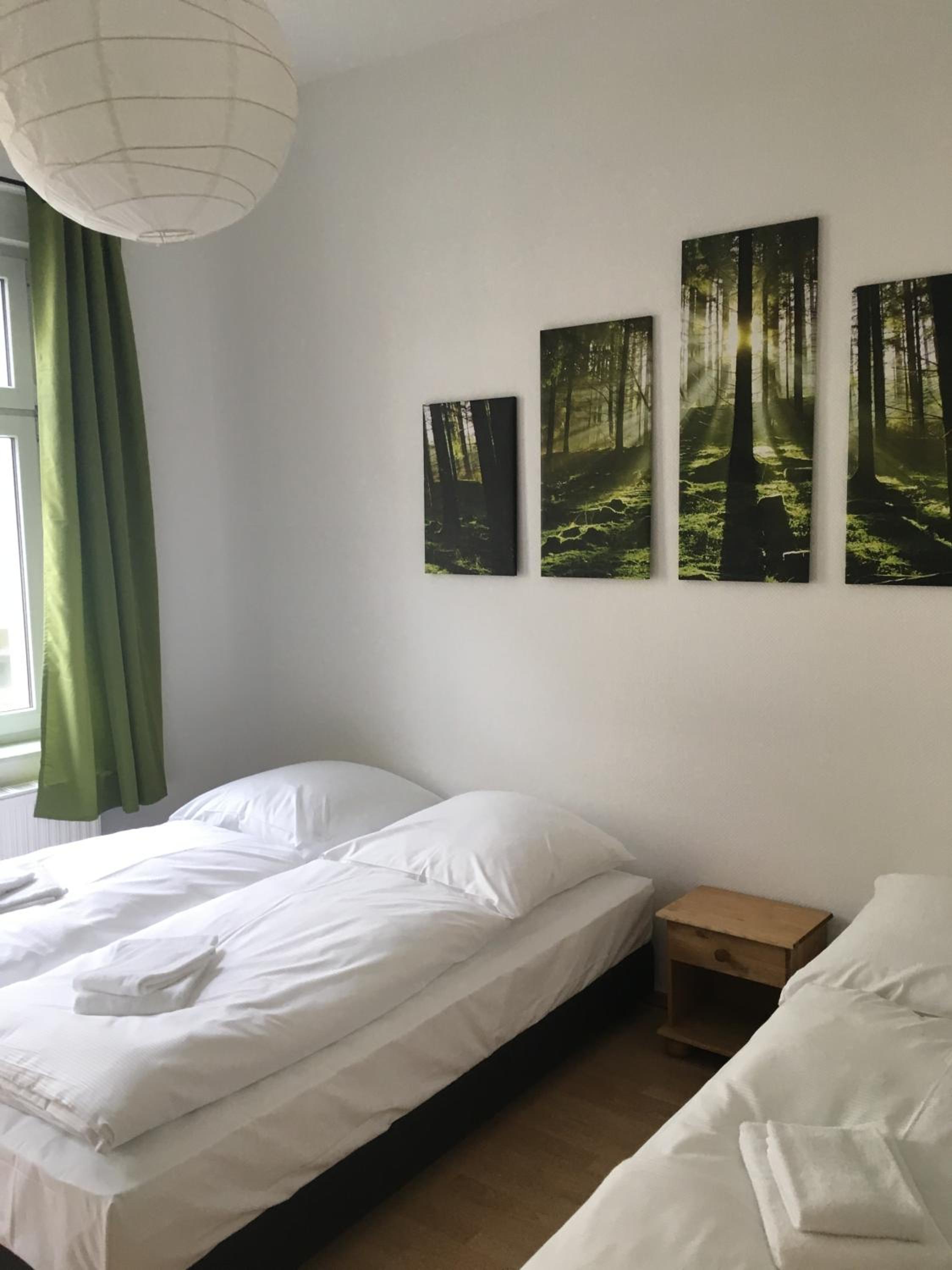 Three-Bedroom Apartment - Photo 10