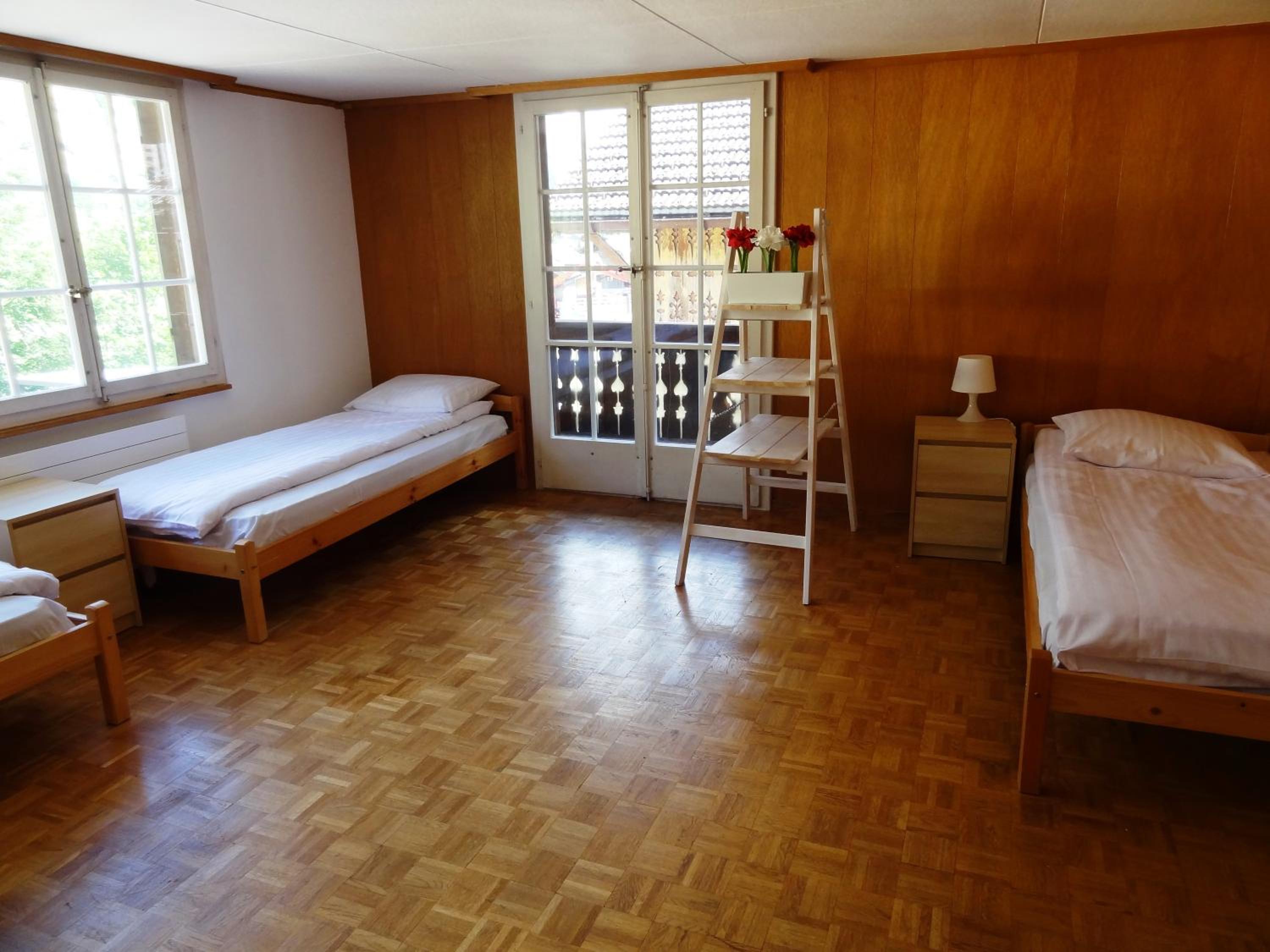 Triple Room with Balcony and shared bathroom photo 1