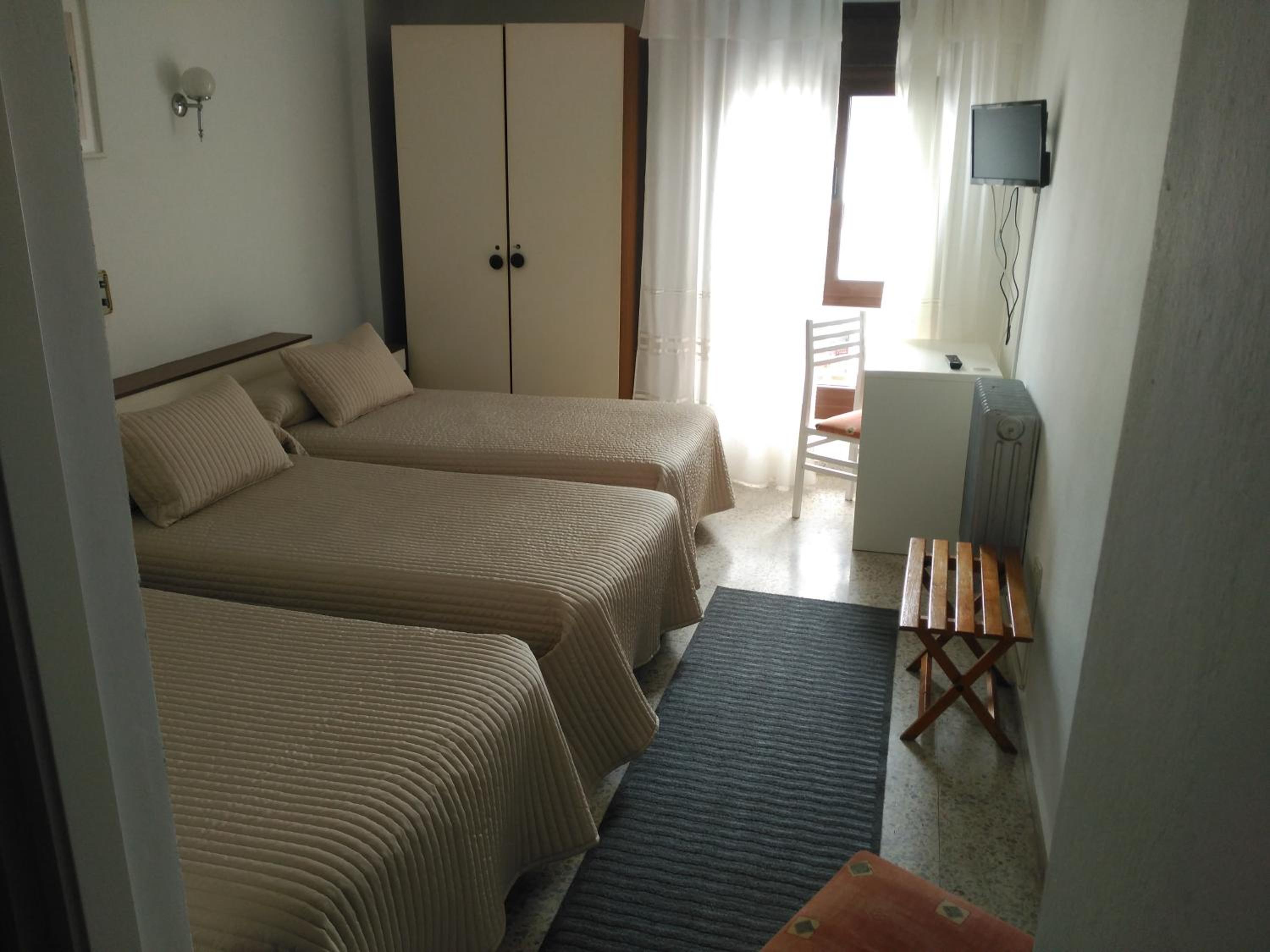 Habitación triple con baño