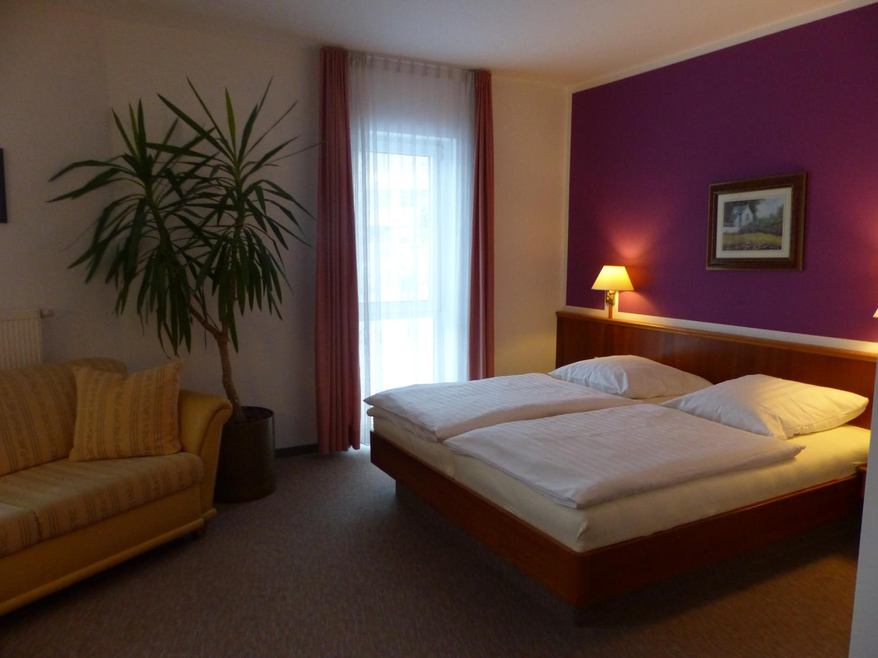 Quadruple Room with Bathroom - Photo 1