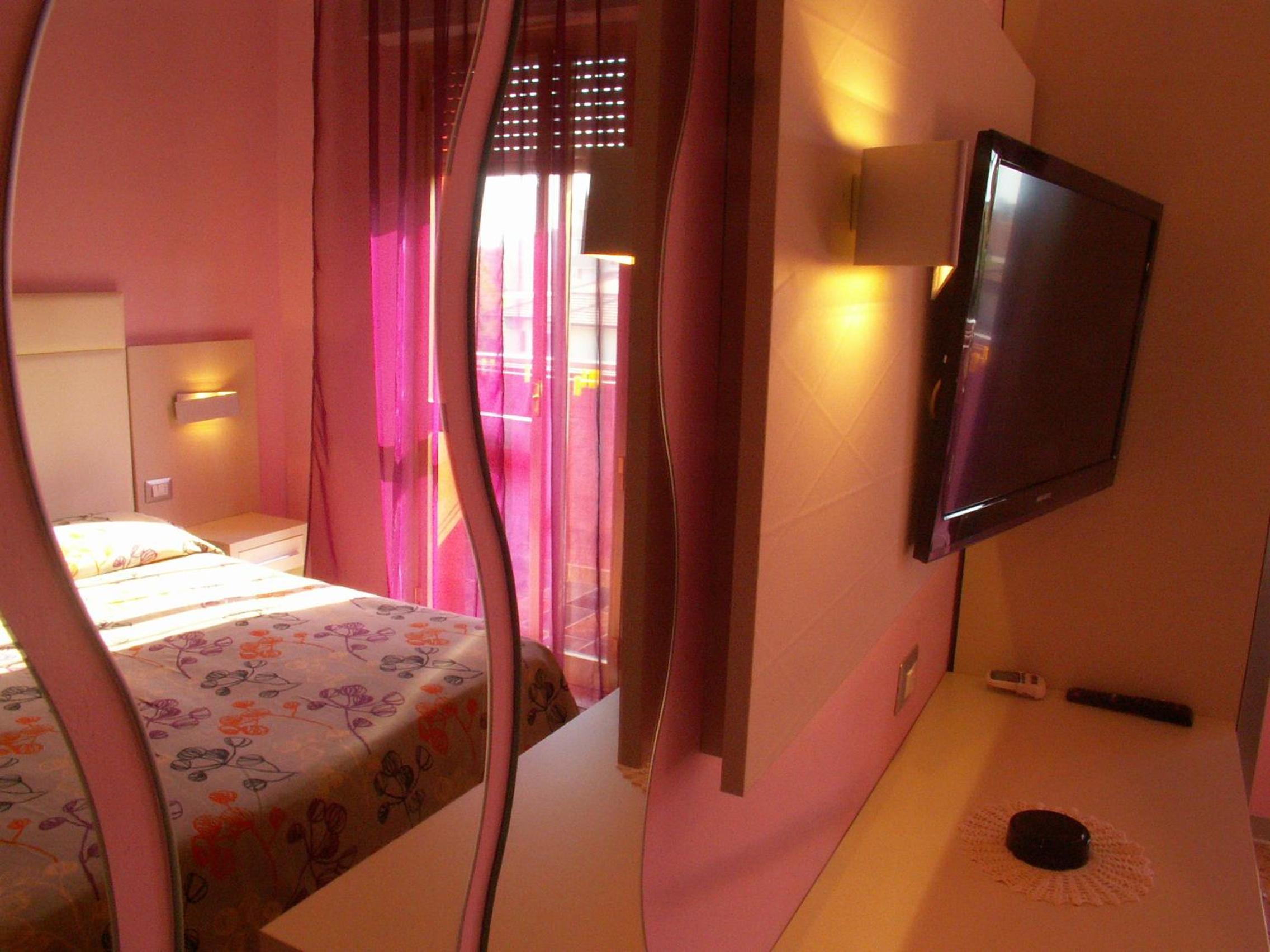 Quadruple Room with Balcony photo 3