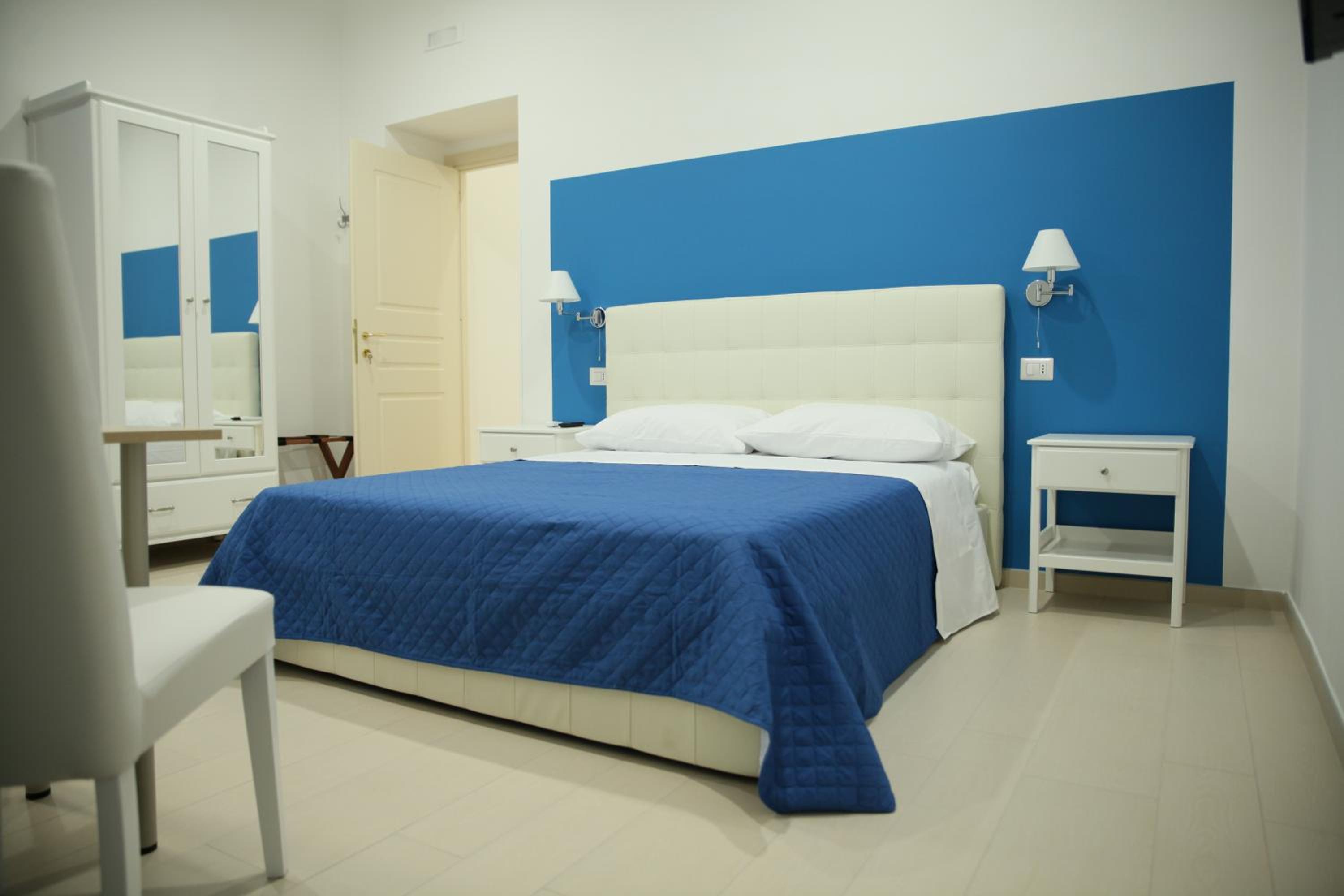 Quadruple Room with Private Bathroom