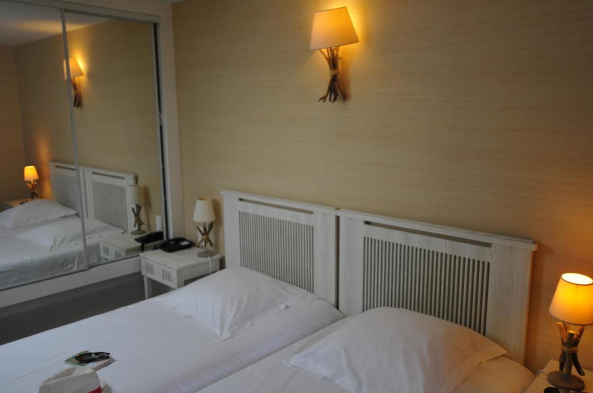 Standard Twin Room - Photo 4