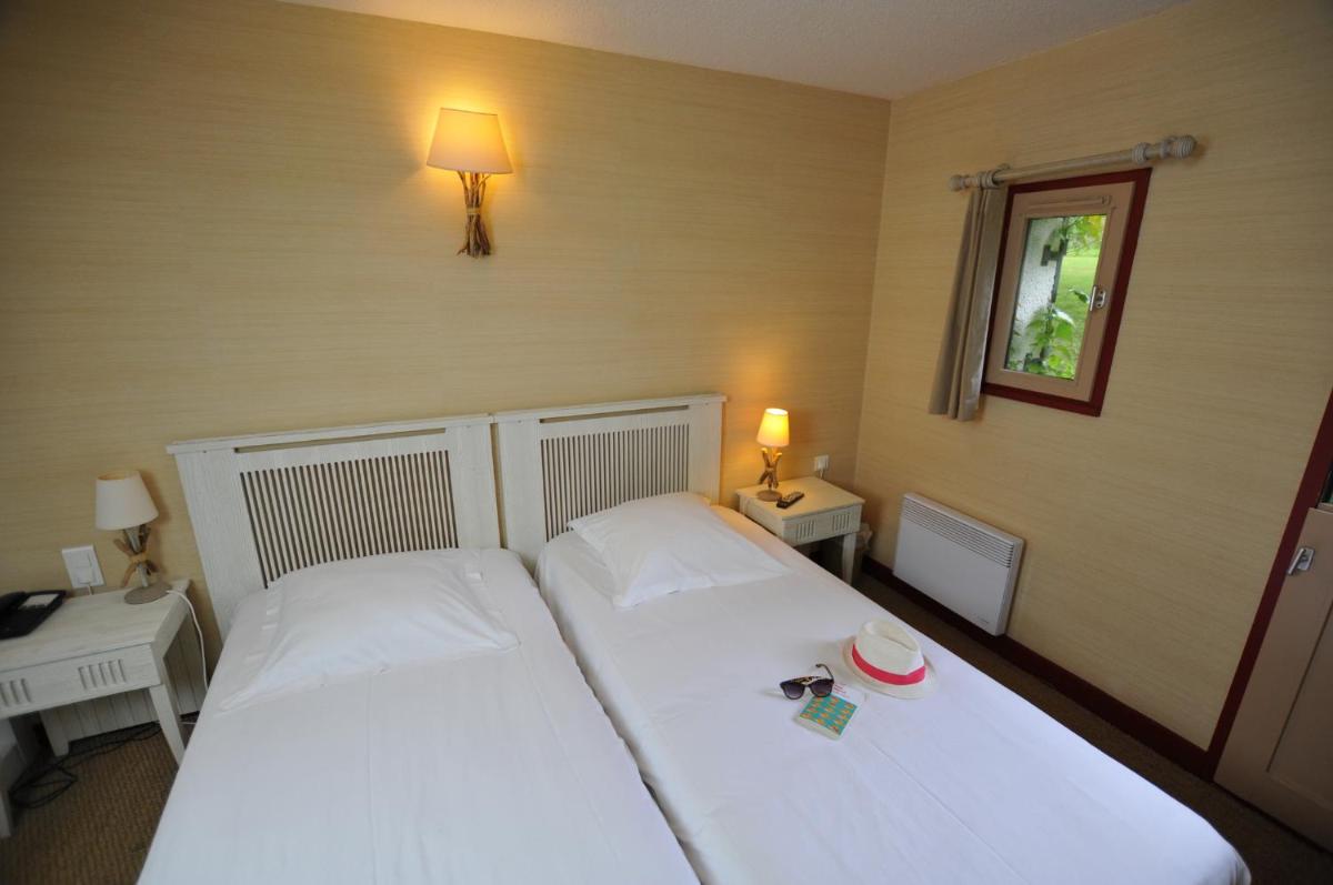 Standard Twin Room - Photo 1