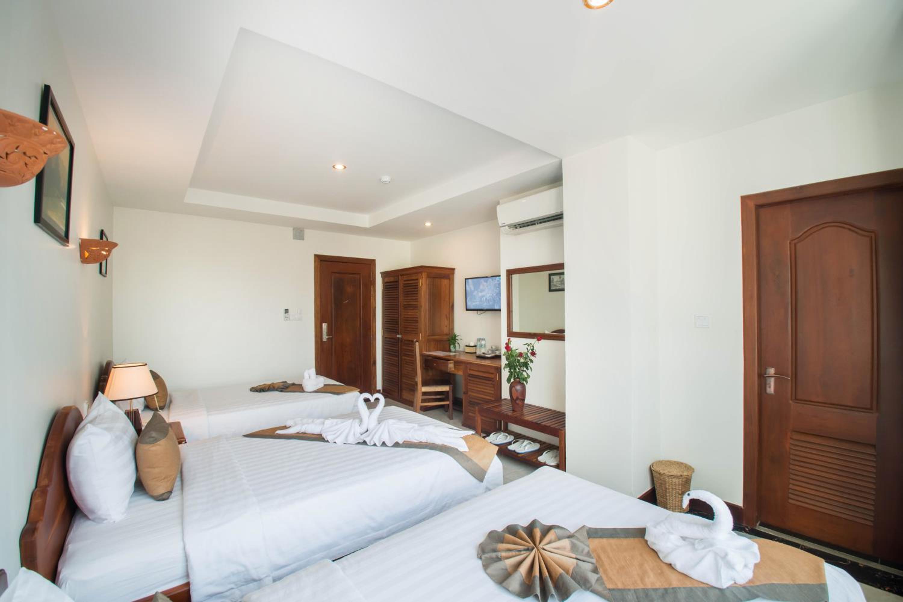 Deluxe Triple Room with City View photo 1