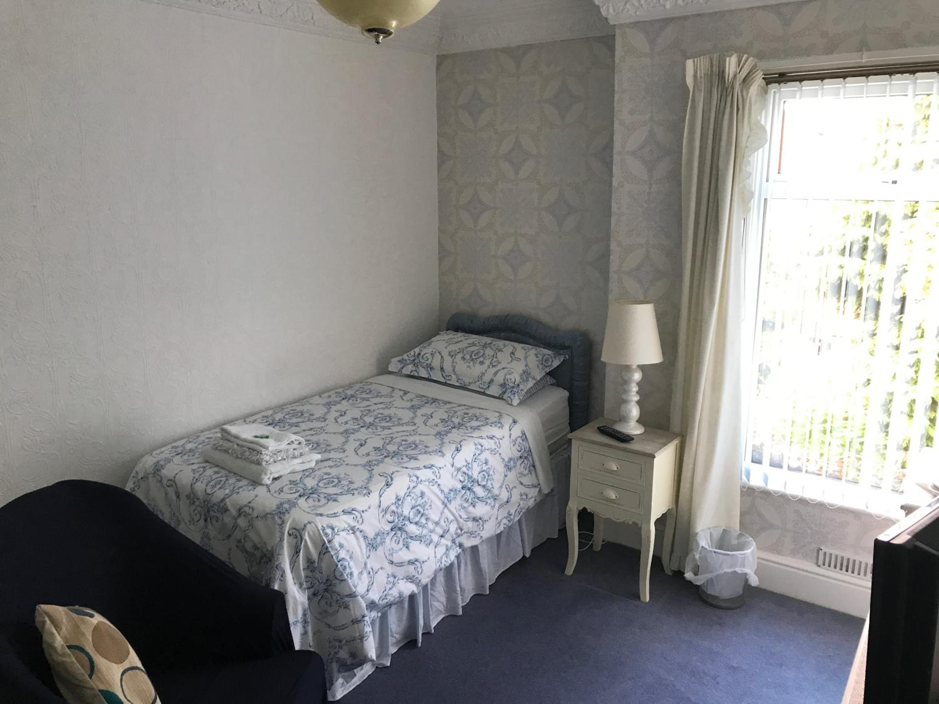 Single Room with Shared Shower and Toilet