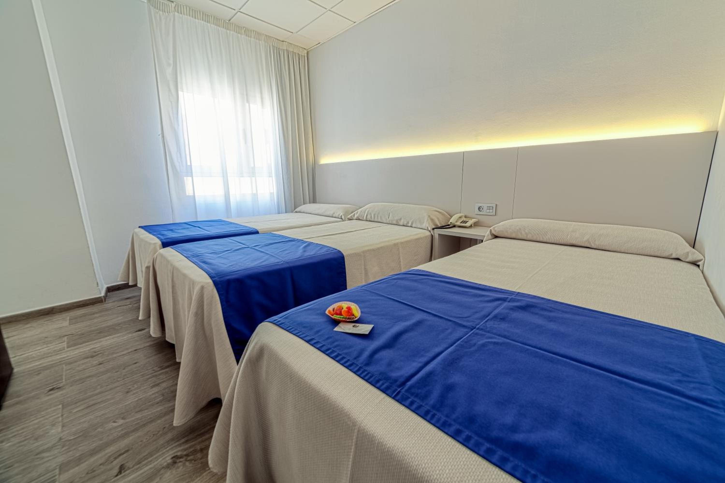 Triple Room - Photo 1