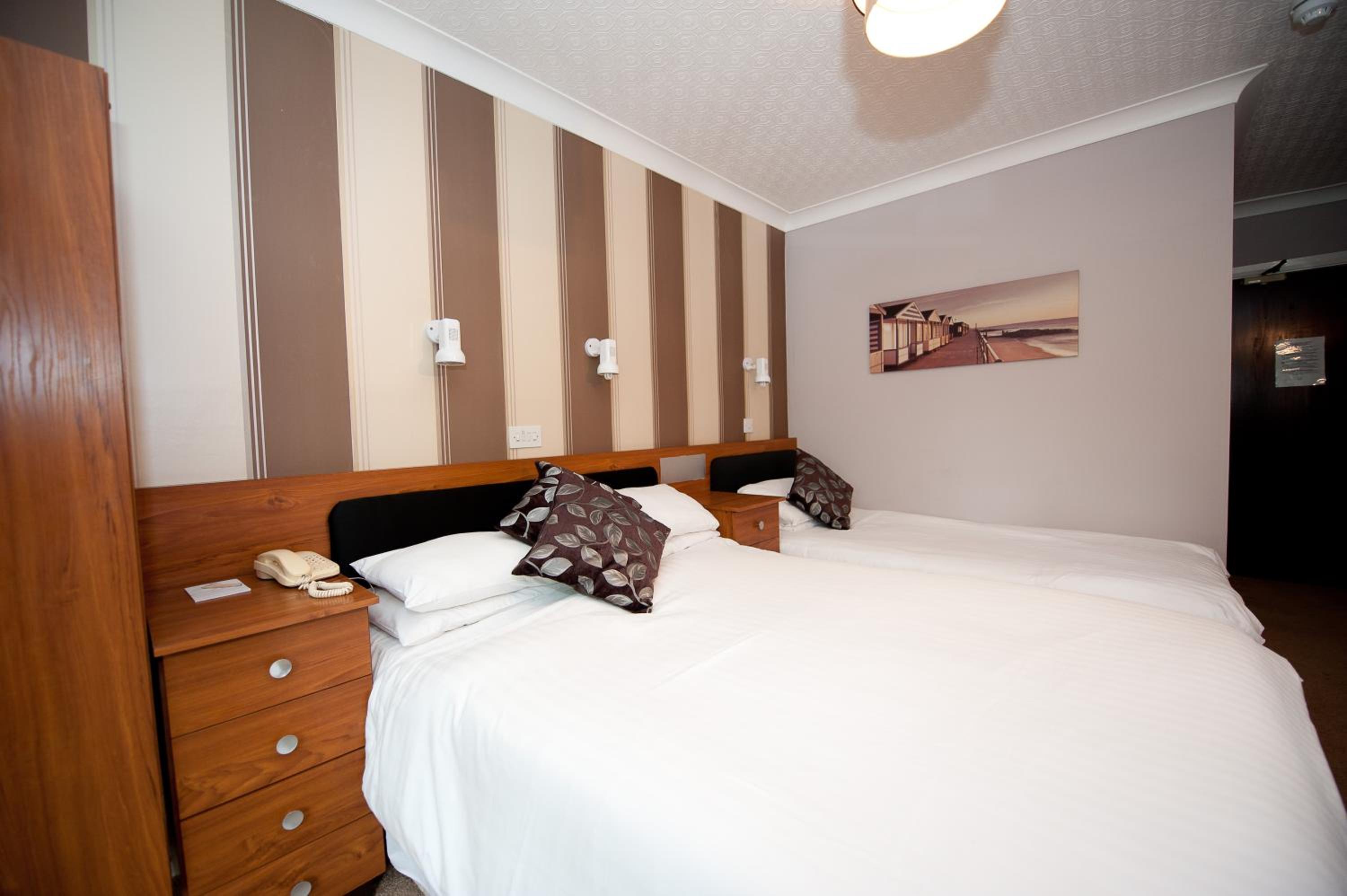 Standard Family Room (2 Adults + 1 Child) - Photo 1