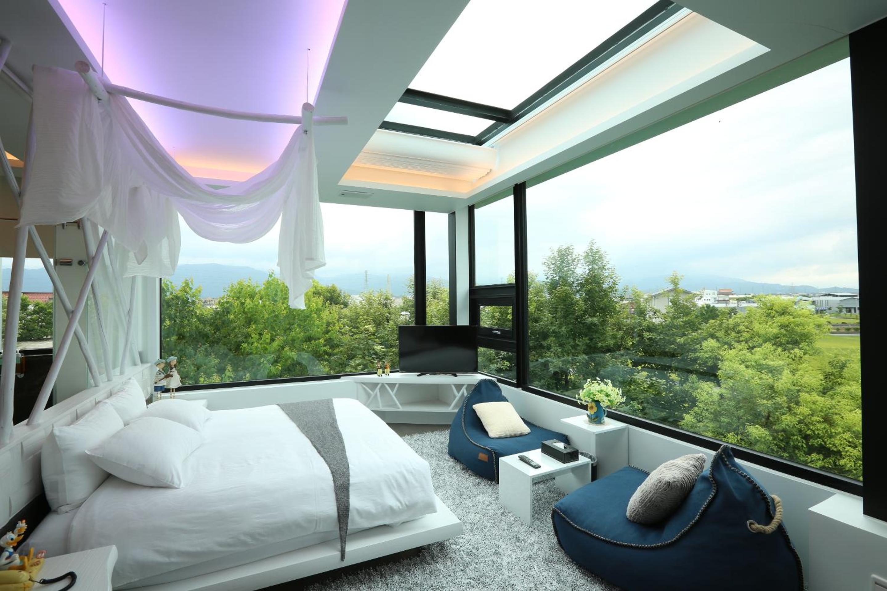 Queen Room with One Queen Bed and One Double Bed