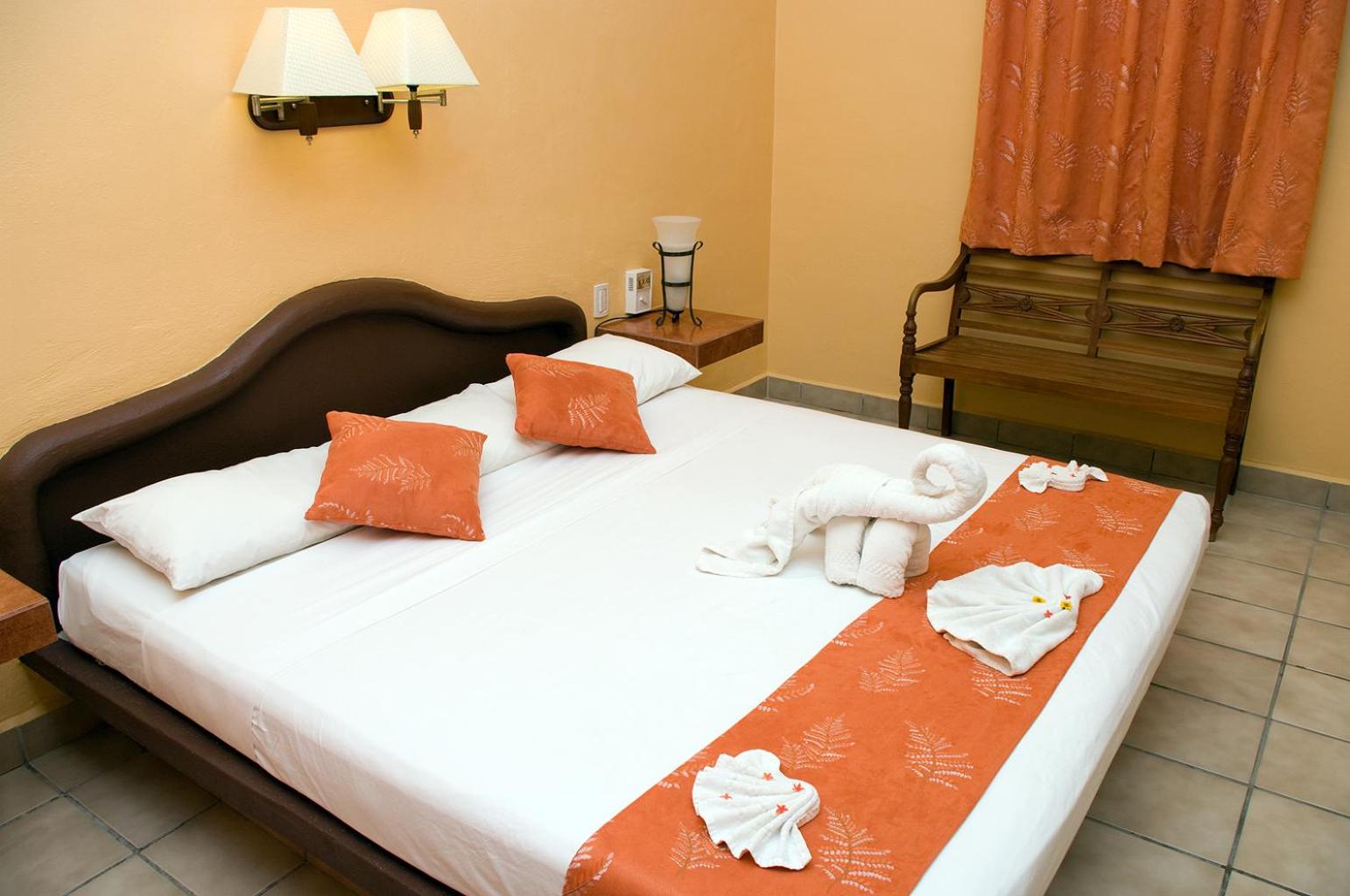 Deluxe Room - Photo 16