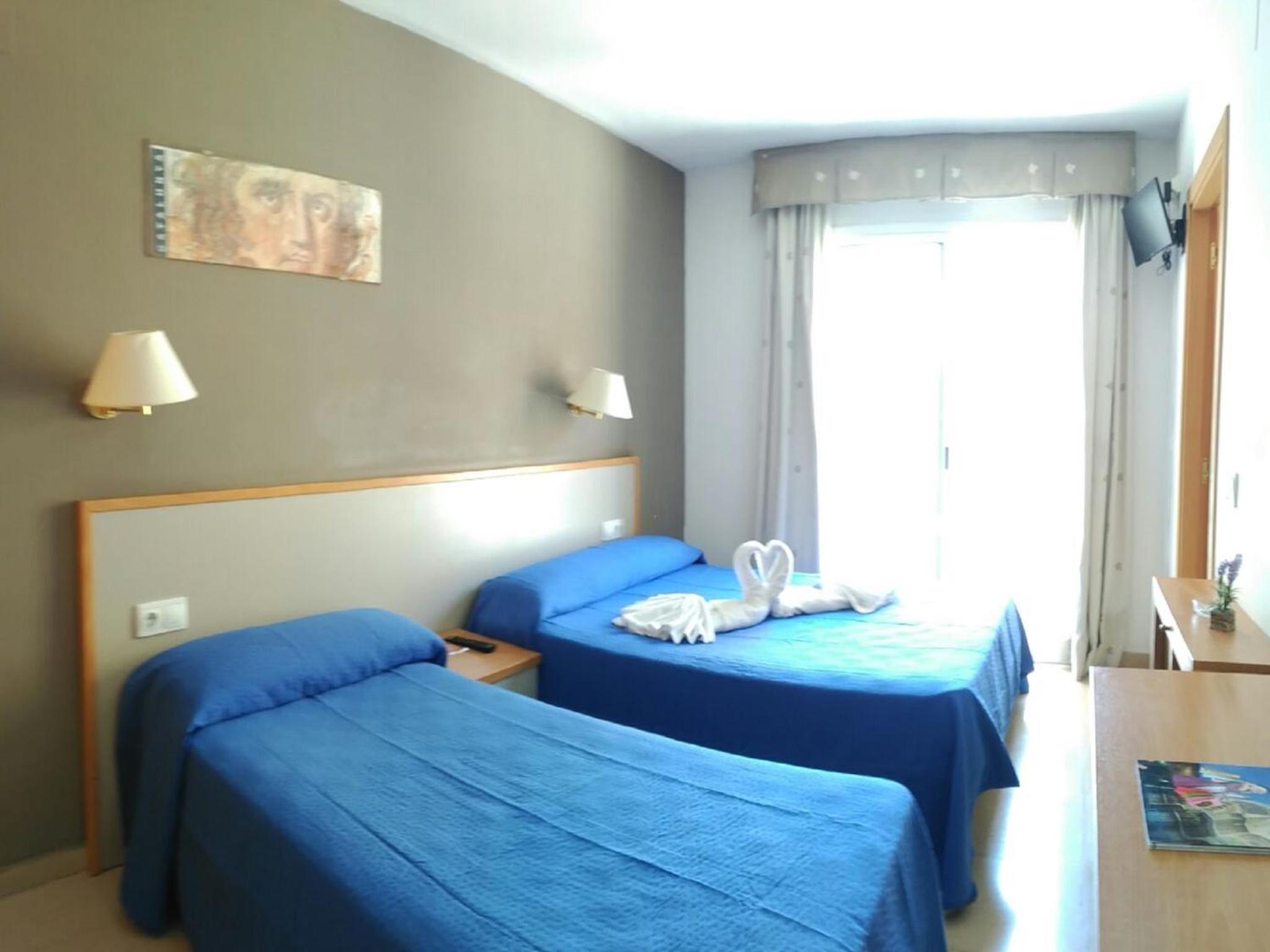Habitación Triple con Balcón