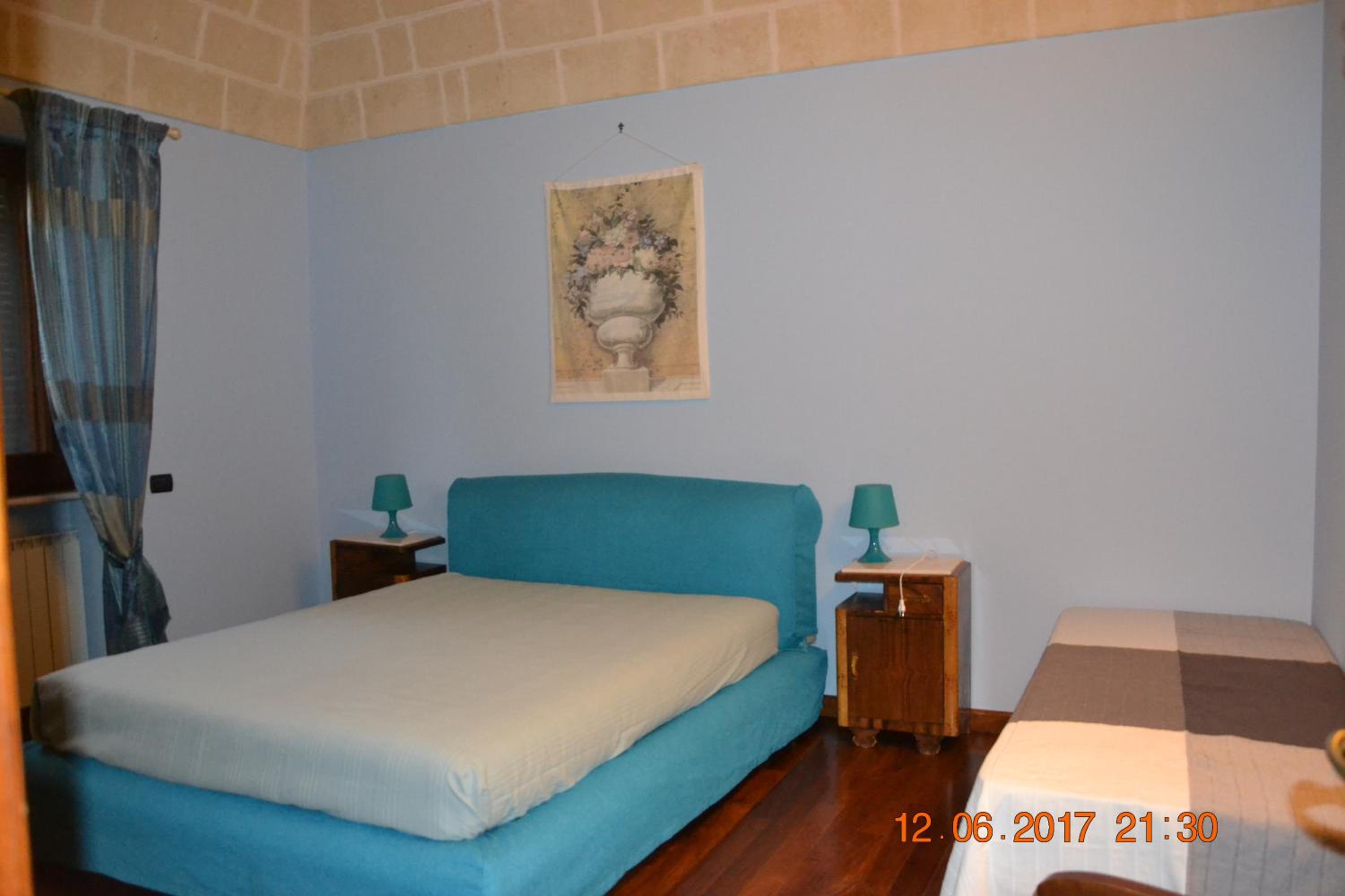 Quadruple Room with Private Bathroom