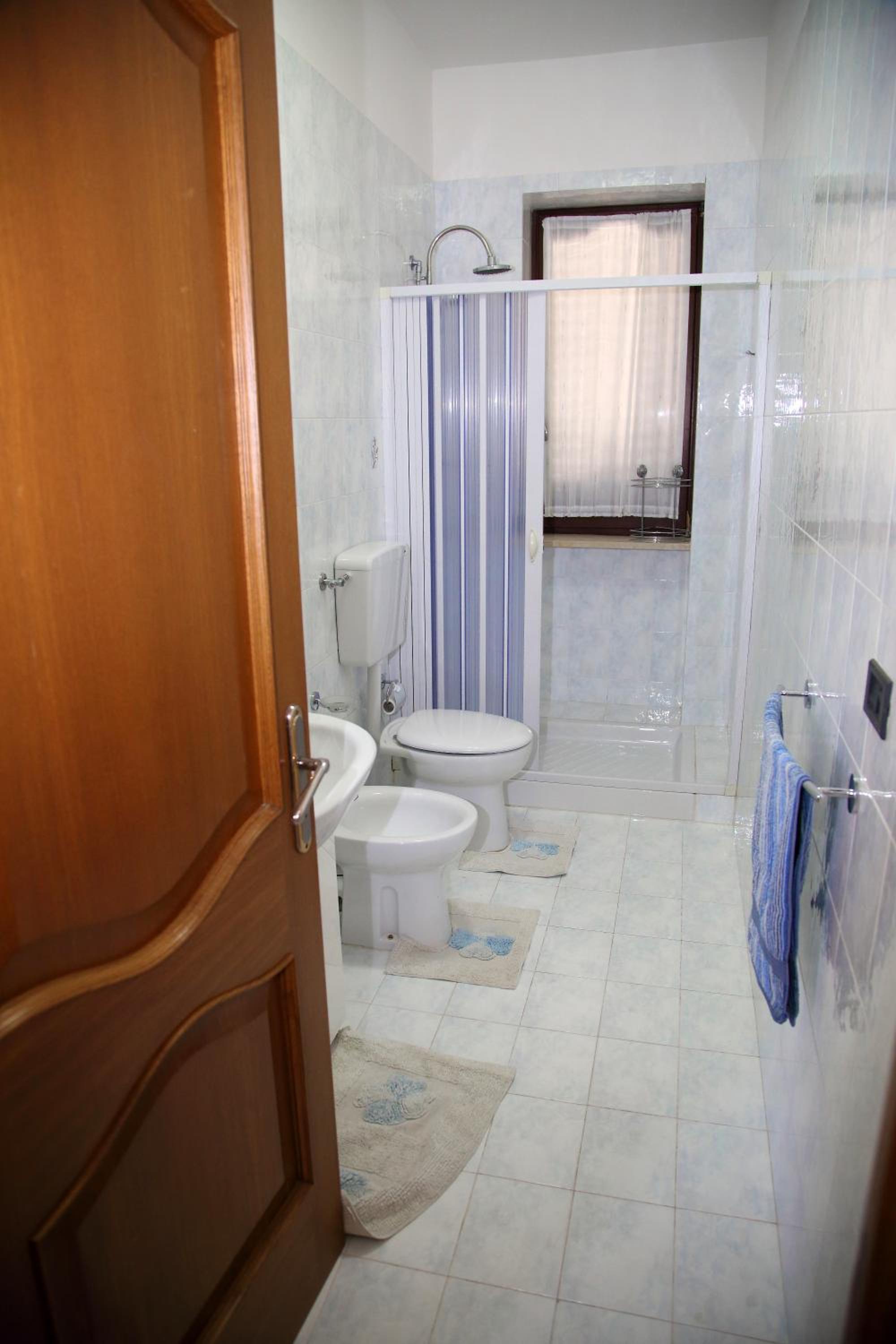 Three-Bedroom Apartment - Photo 10